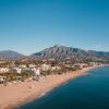 Photograph of Marbella on a sunny day, with views of the Mediterranean and La Concha Mountain