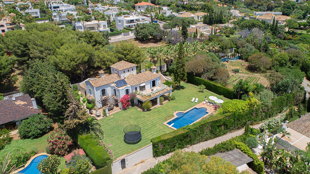 an aerial shot of villas in Marbella, featured image for the article