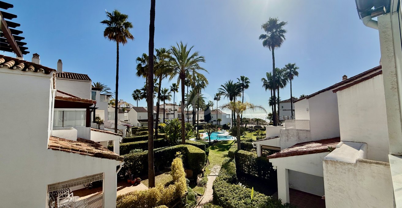 Magnificent front line beach townhouse, located in Bahia de Marbella, Marbella East.