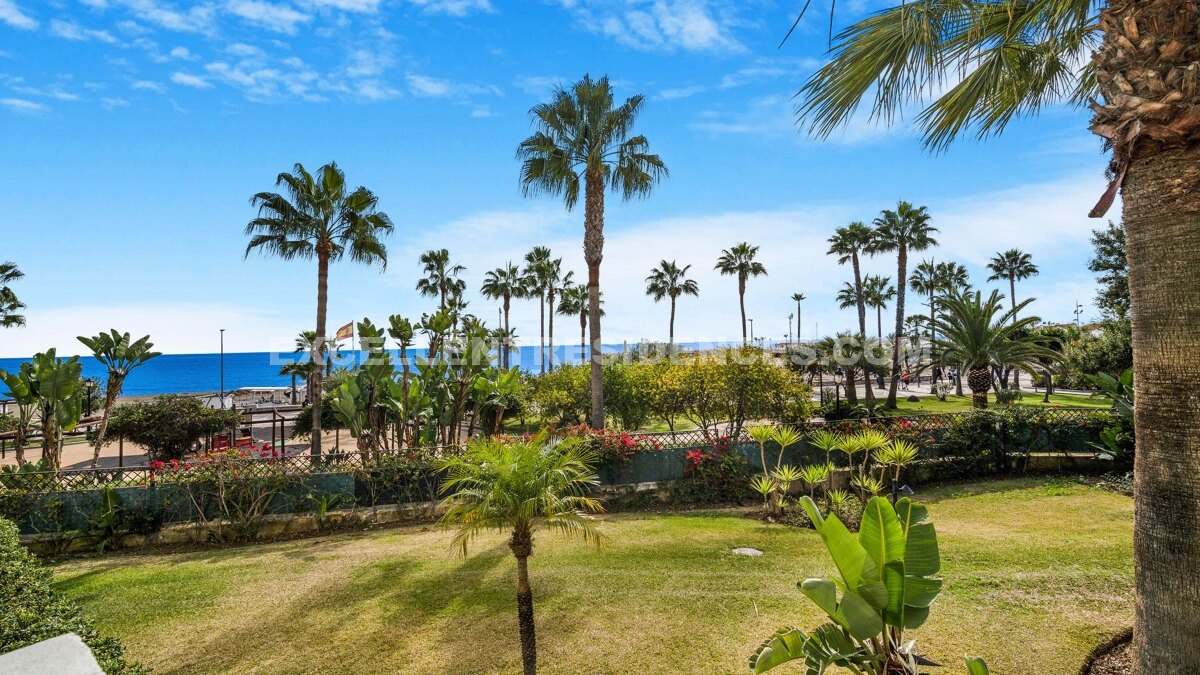 Stunning beachfront apartment in Puerto Banús with direct sea views and exclusive gated community amenities.