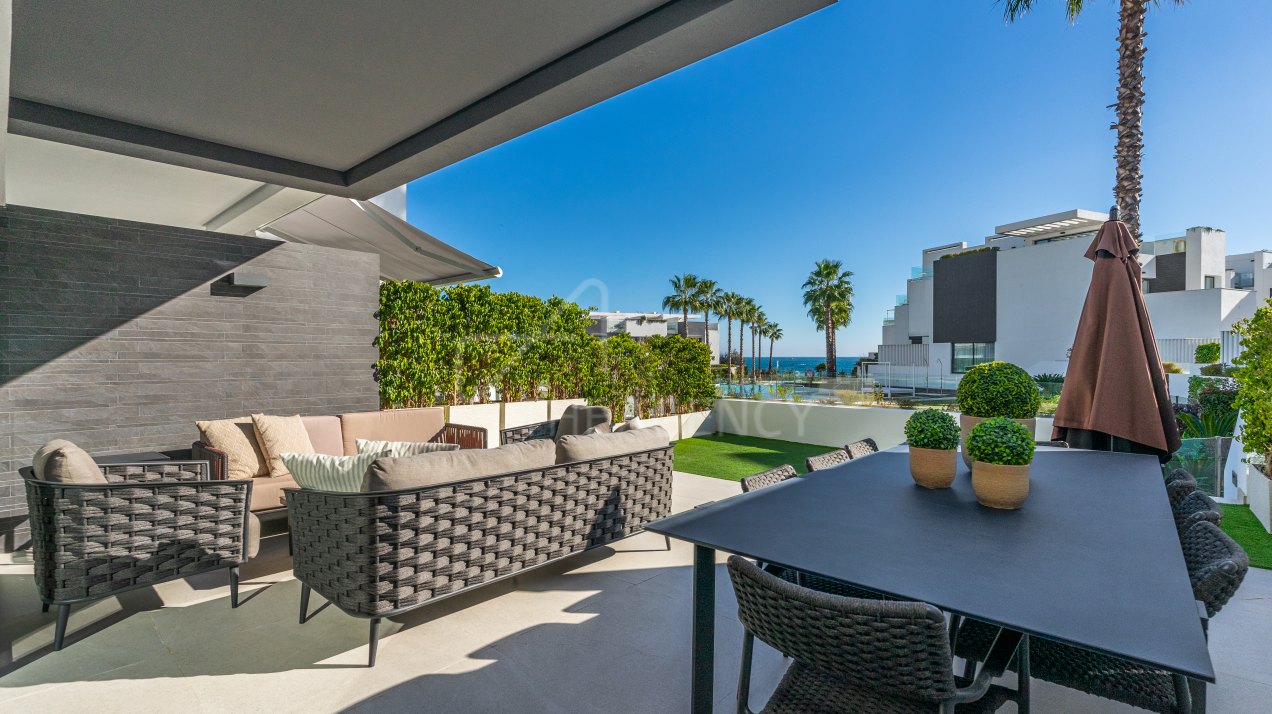 Stunning modern Townhouse with amazing sea views in frontline beach in Estepona.