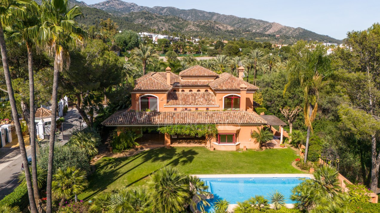 Exquisite Andalusian Manor nestled within a Prestigious Gated Community along the famed Golden Mile