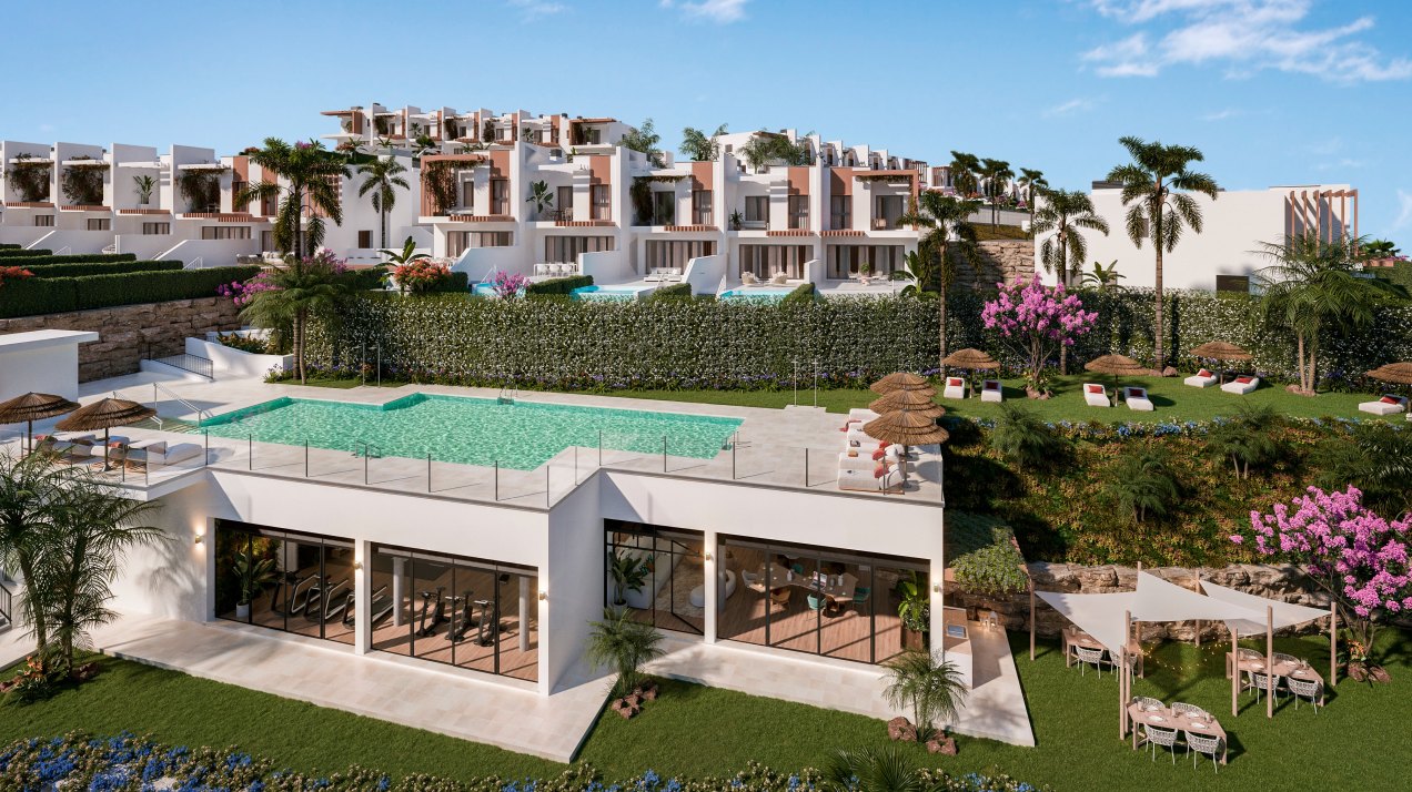 Complex of townhouses with panoramic views next to El Chaparral golf course