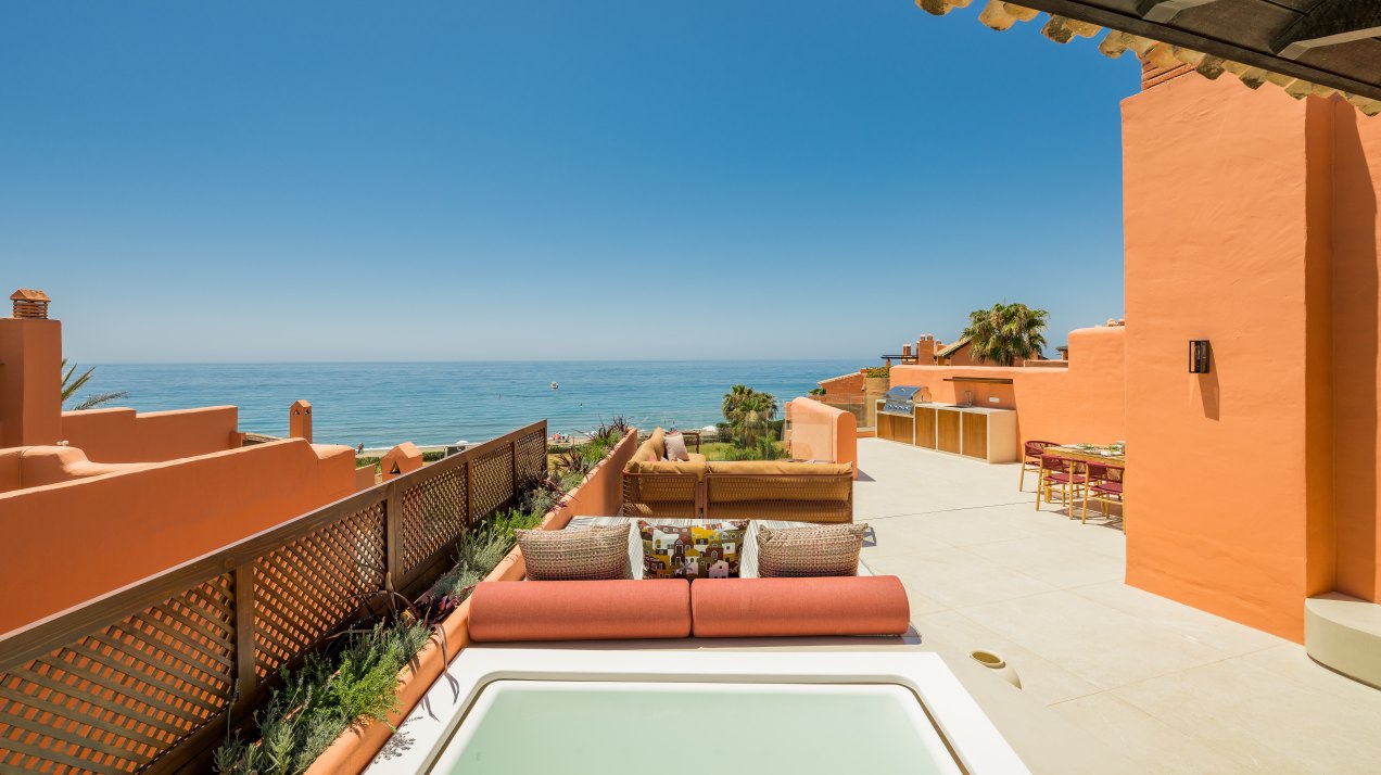 Distinguished front line beach duplex penthouse in La Morera, Marbella East and direct access to the sea