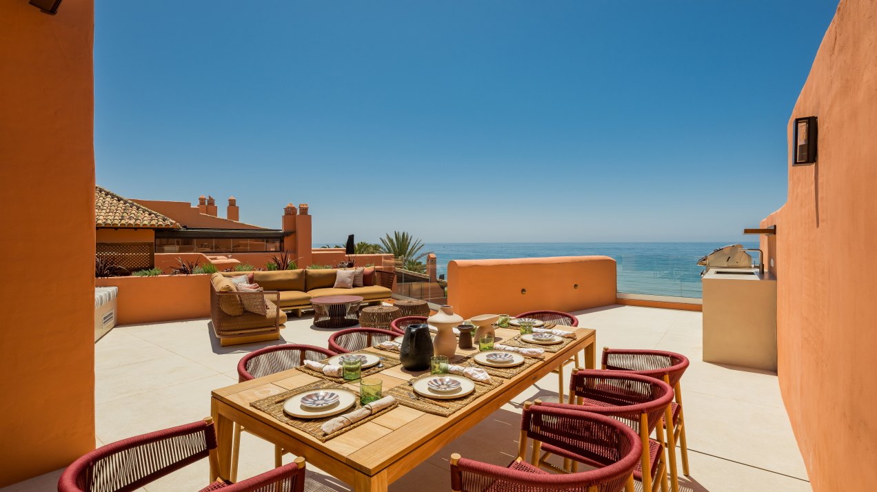 Distinguished front line beach duplex penthouse in La Morera, Marbella East and direct access to the sea