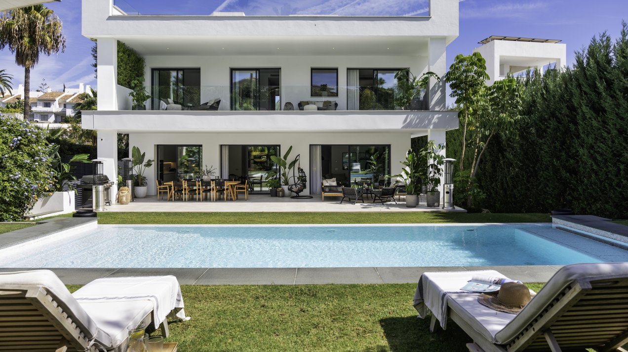 Luxury villa of modern elegance and unique location, bordering Puerto Banus, Marbella