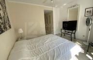 Spacious renovated ground-floor apartment with three bedrooms and a garage in Xarblanca, Marbella