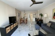 Spacious renovated ground-floor apartment with three bedrooms and a garage in Xarblanca, Marbella