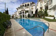 Spacious renovated ground-floor apartment with three bedrooms and a garage in Xarblanca, Marbella