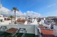 Building with three apartments and three commercial premises in Marbella's old town.