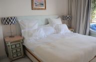 Exclusive 2-bedroom oceanfront apartment for sale in Marina Mariola, Marbella