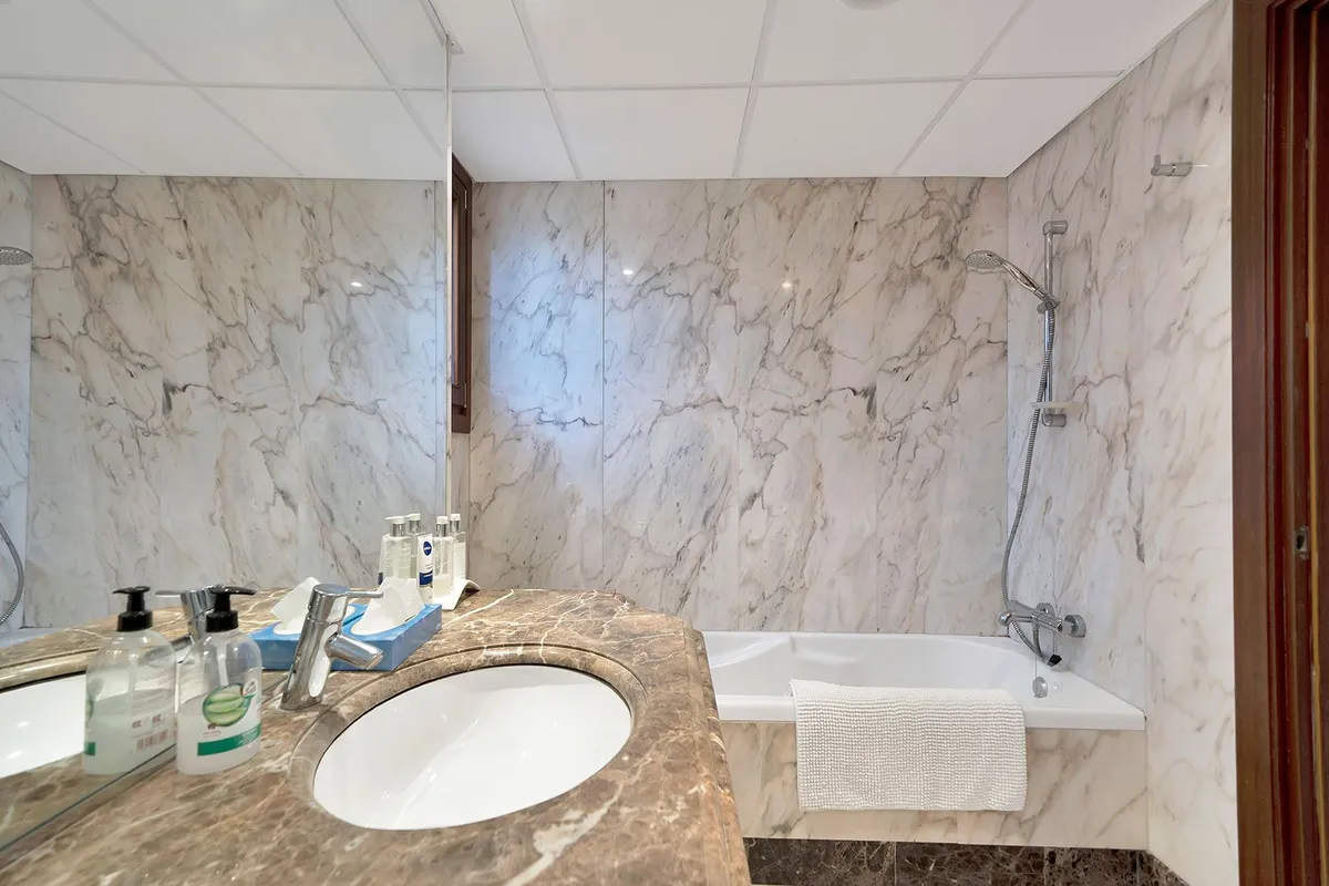 Ground floor apartment for sale in New Golden Mile with 2 bedrooms