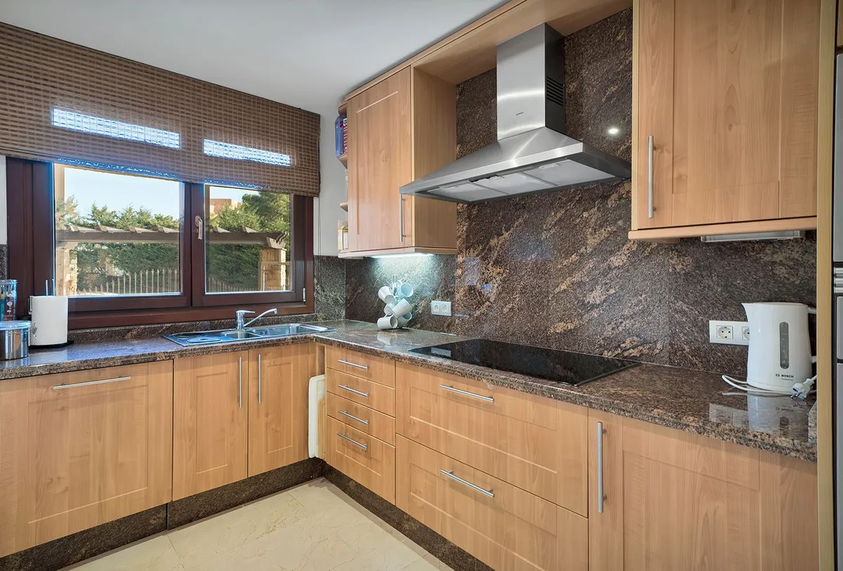 Ground floor apartment for sale in New Golden Mile with 2 bedrooms