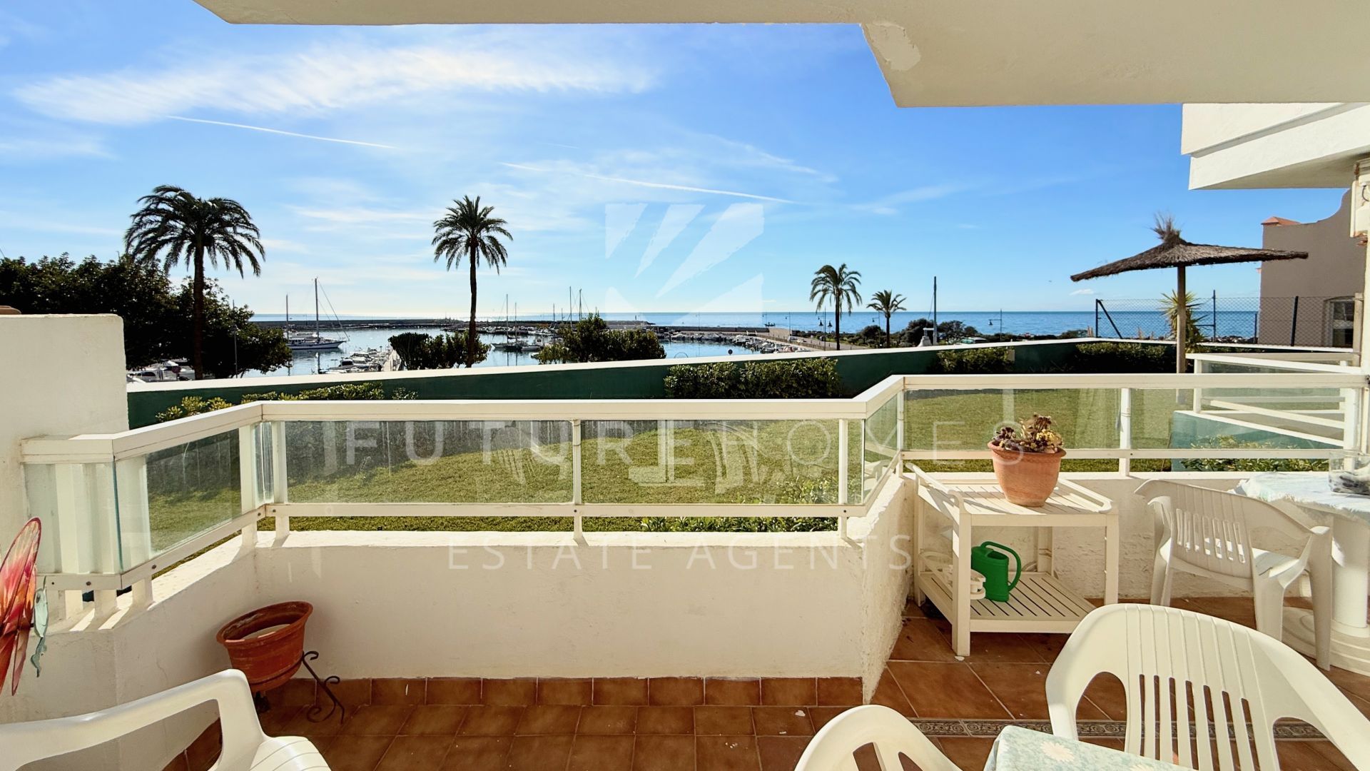 EXCLUSIVE - Sunny South-Facing Two Bedroom Apartment with Sea Views in Estepona Marina – Prime Location & Renovation Potential