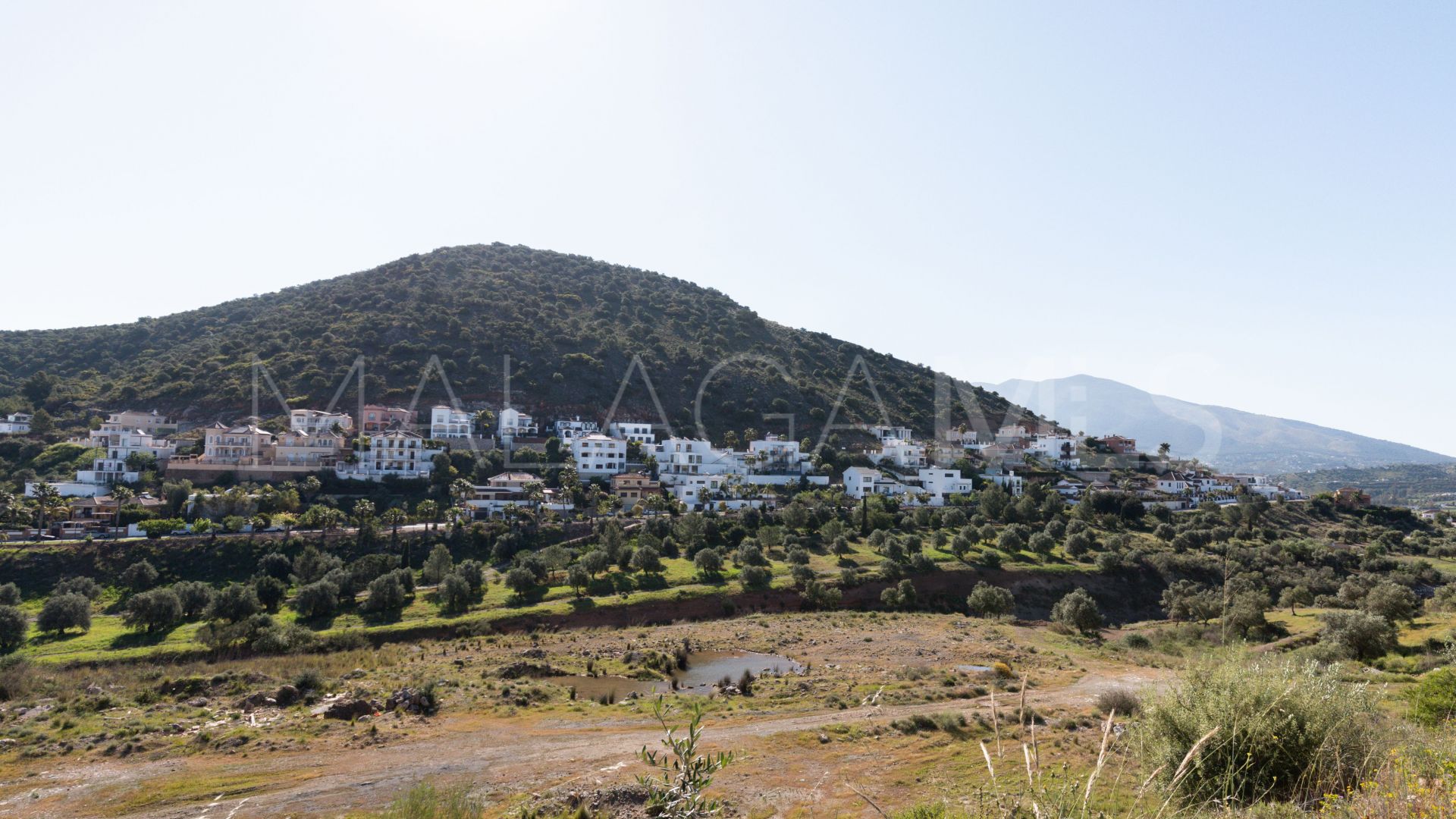 Plot in Coin for sale