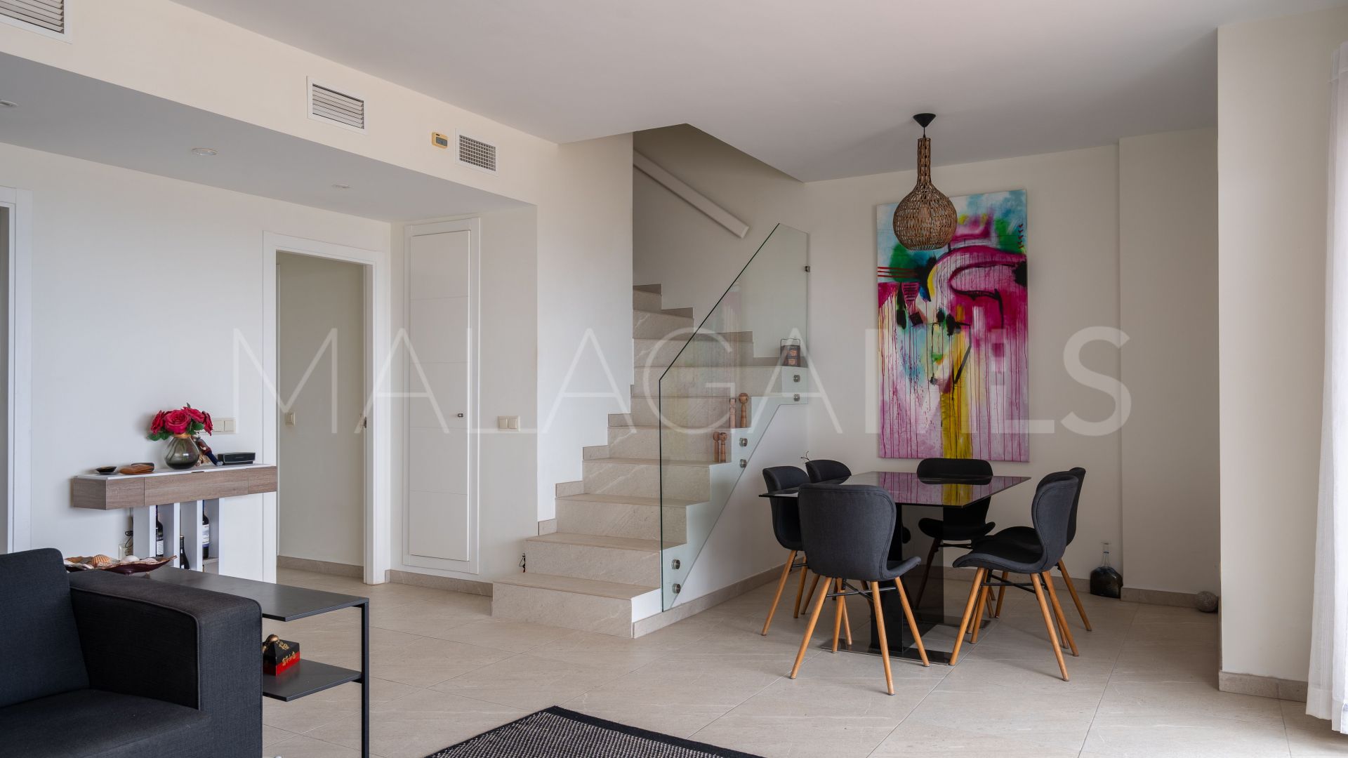 Buy duplex penthouse with 2 bedrooms in Mijas Costa