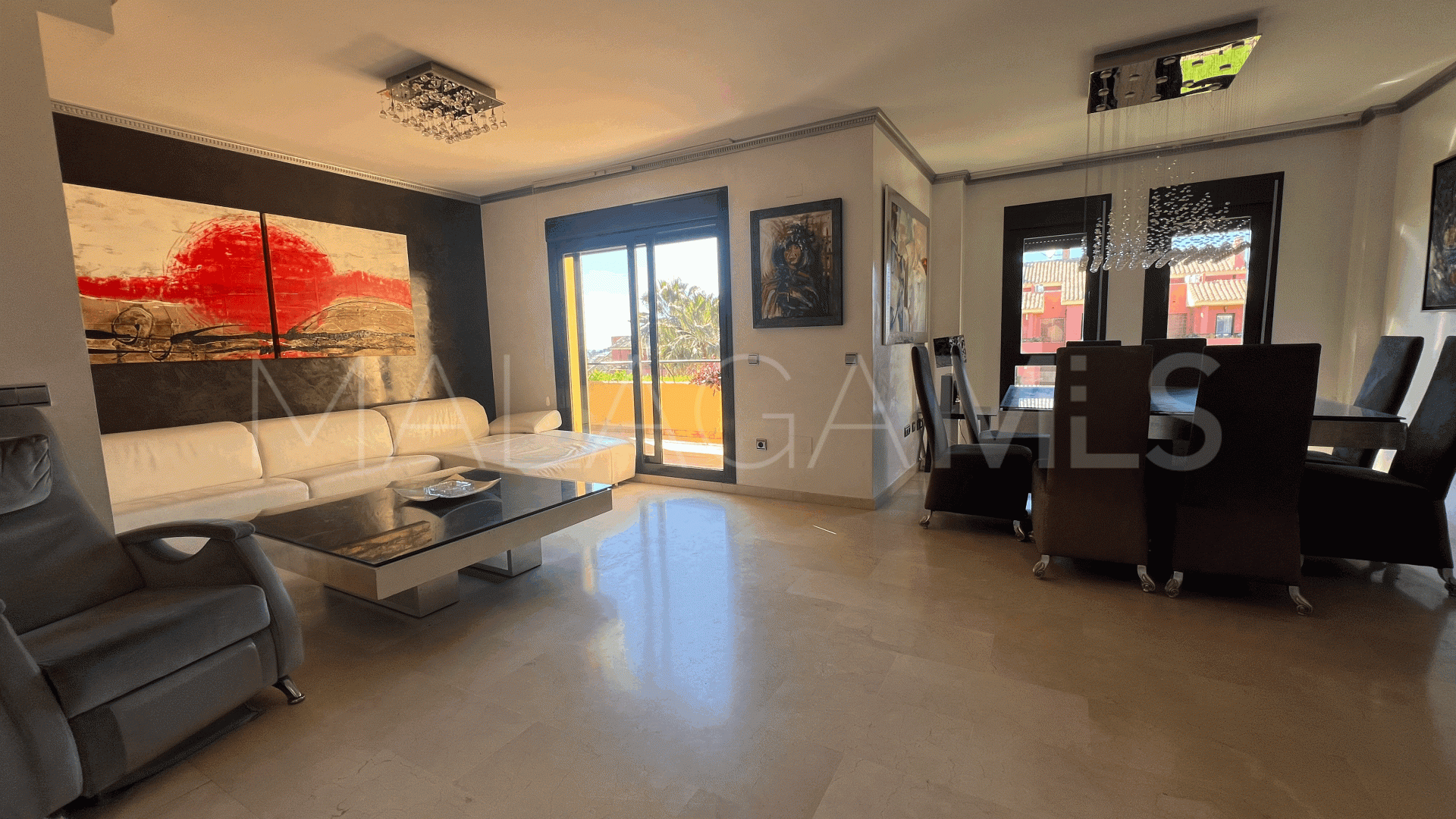 Buy duplex penthouse with 4 bedrooms in Estepona East