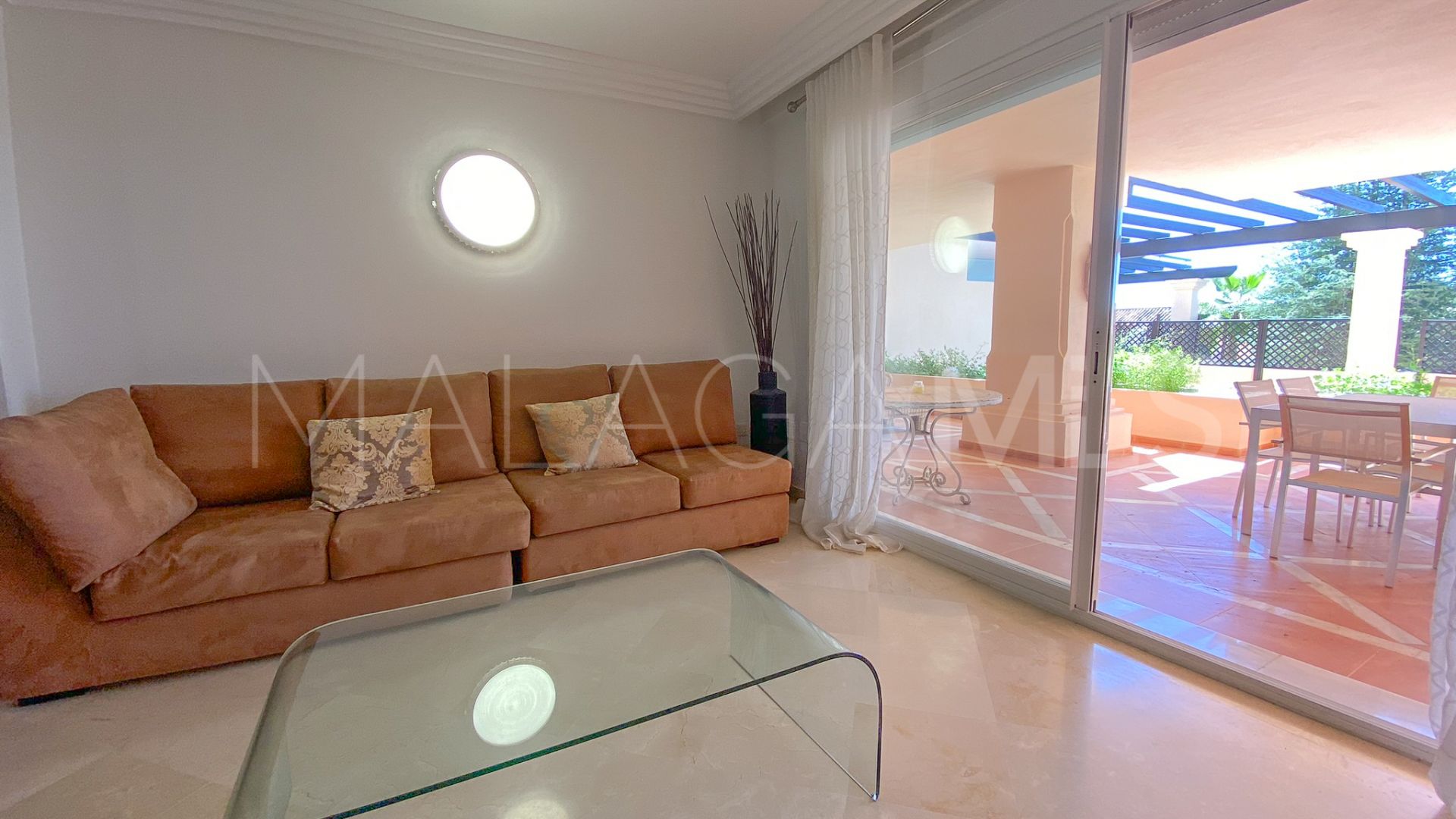 For sale Nueva Andalucia ground floor apartment with 2 bedrooms