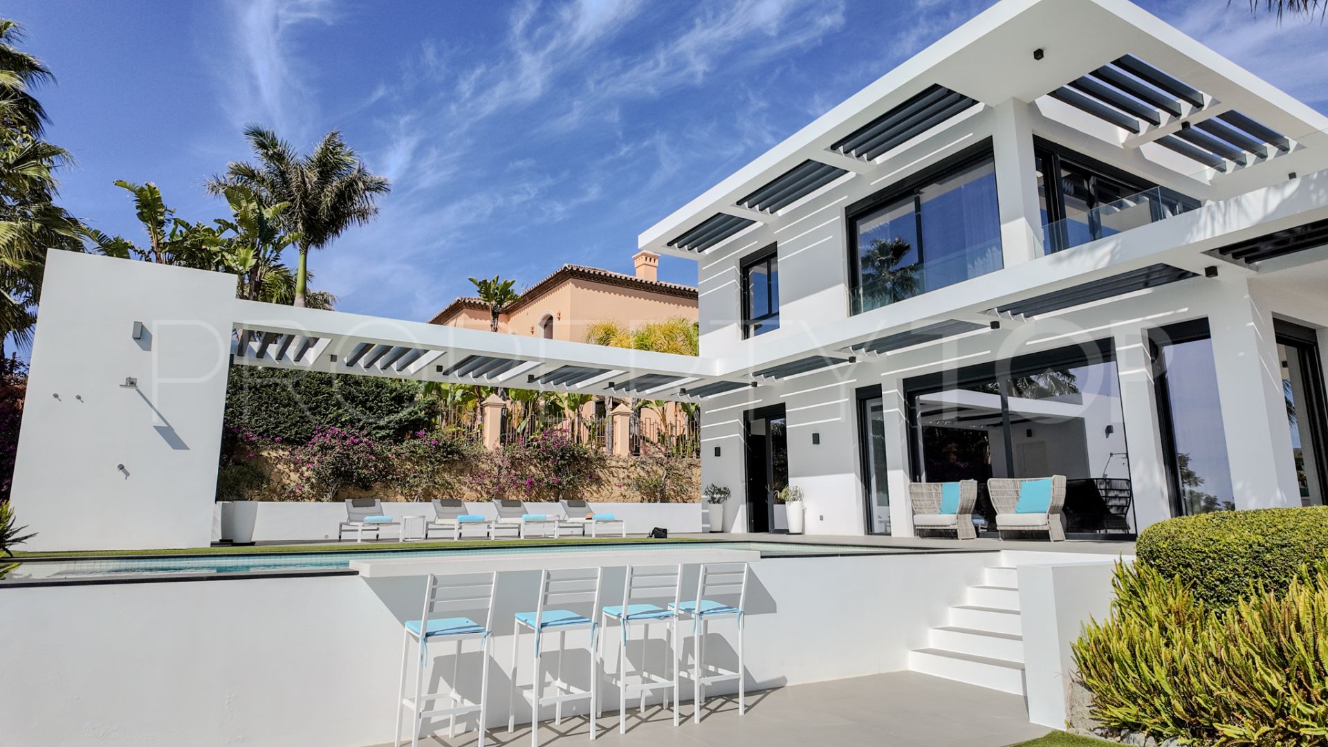 Buy villa in Los Flamingos with 4 bedrooms
