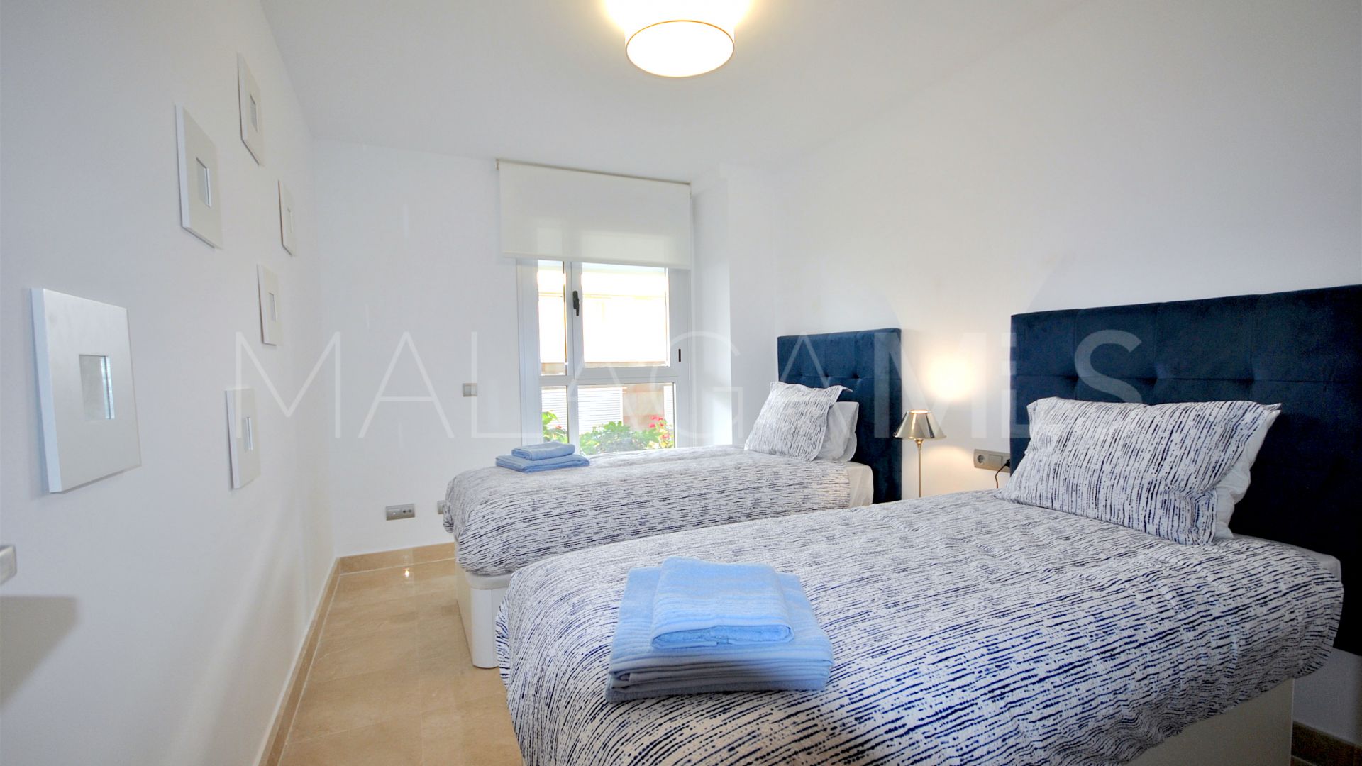 Buy San Pedro de Alcantara ground floor apartment with 2 bedrooms
