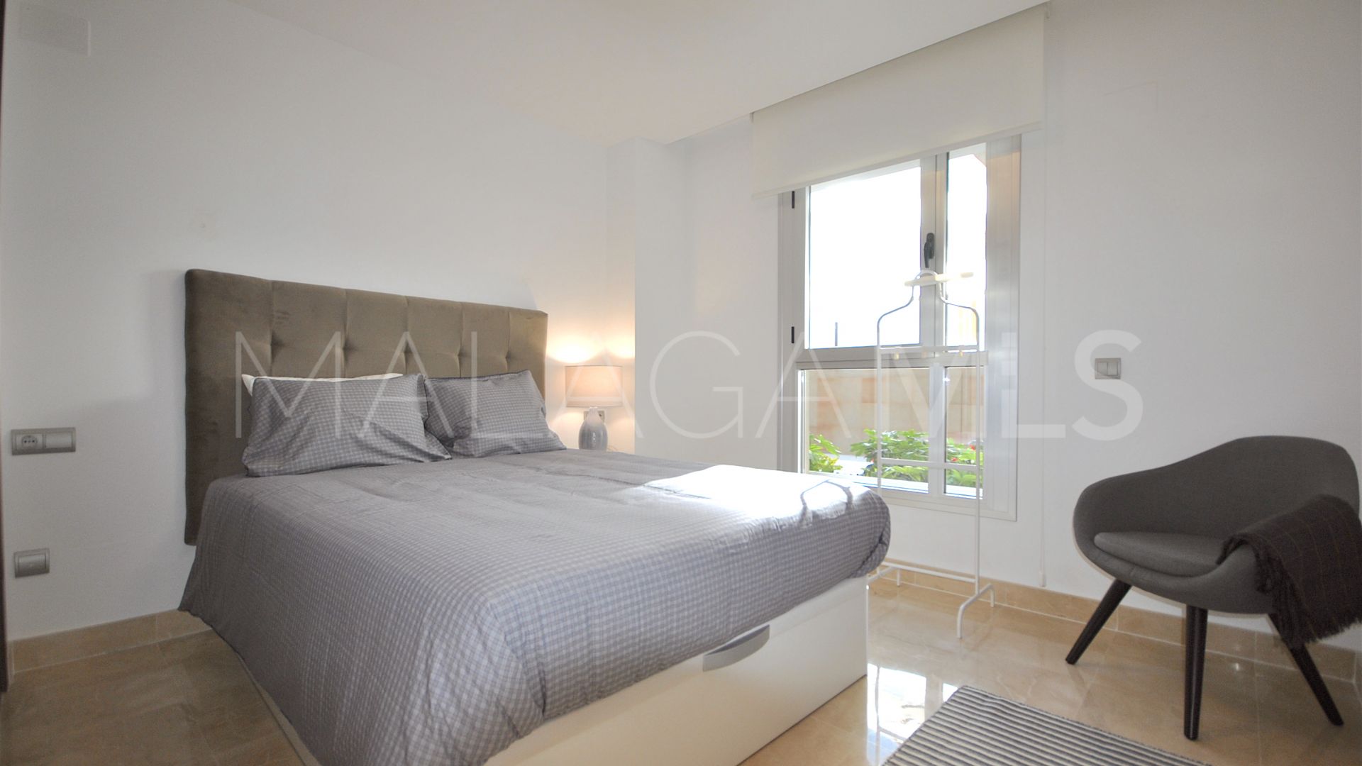 Buy San Pedro de Alcantara ground floor apartment with 2 bedrooms