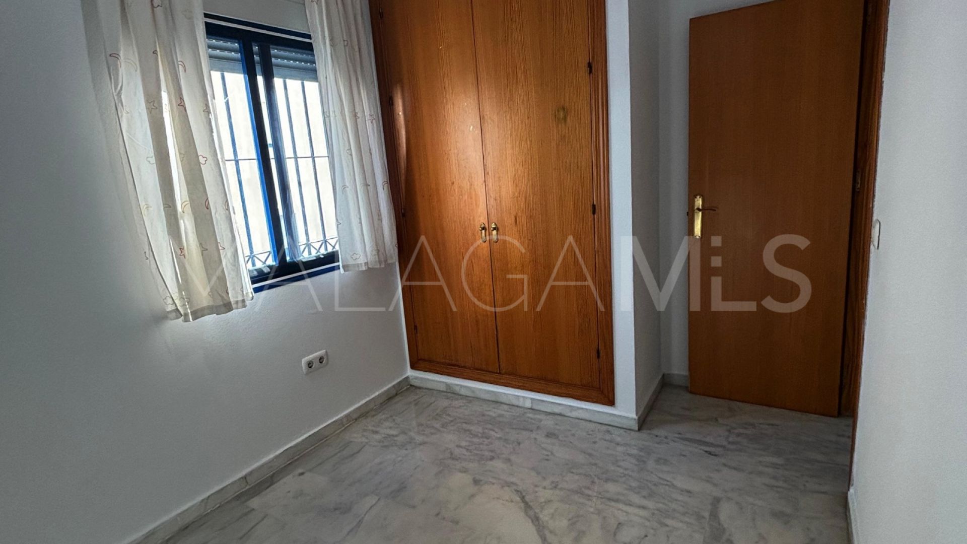 Buy apartamento planta baja in Estepona Centro with 2 bedrooms