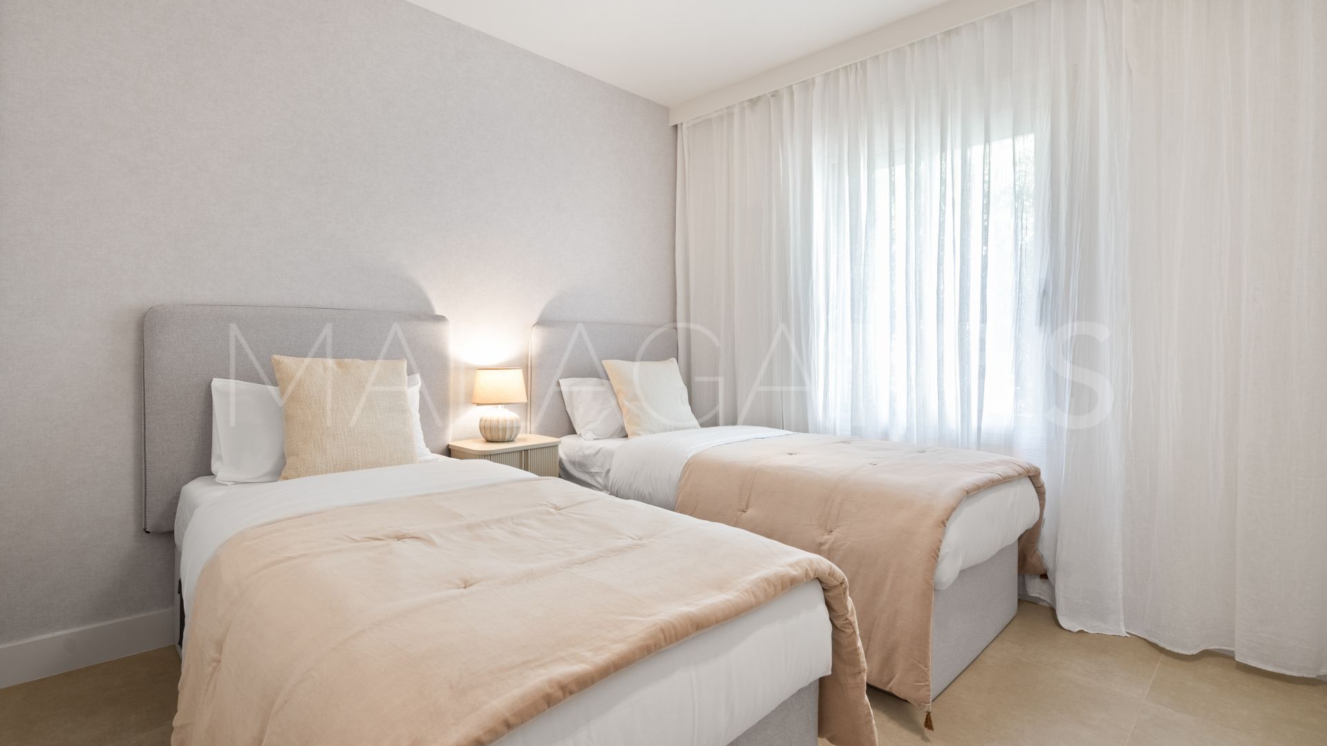 For sale Nueva Andalucia ground floor apartment with 3 bedrooms