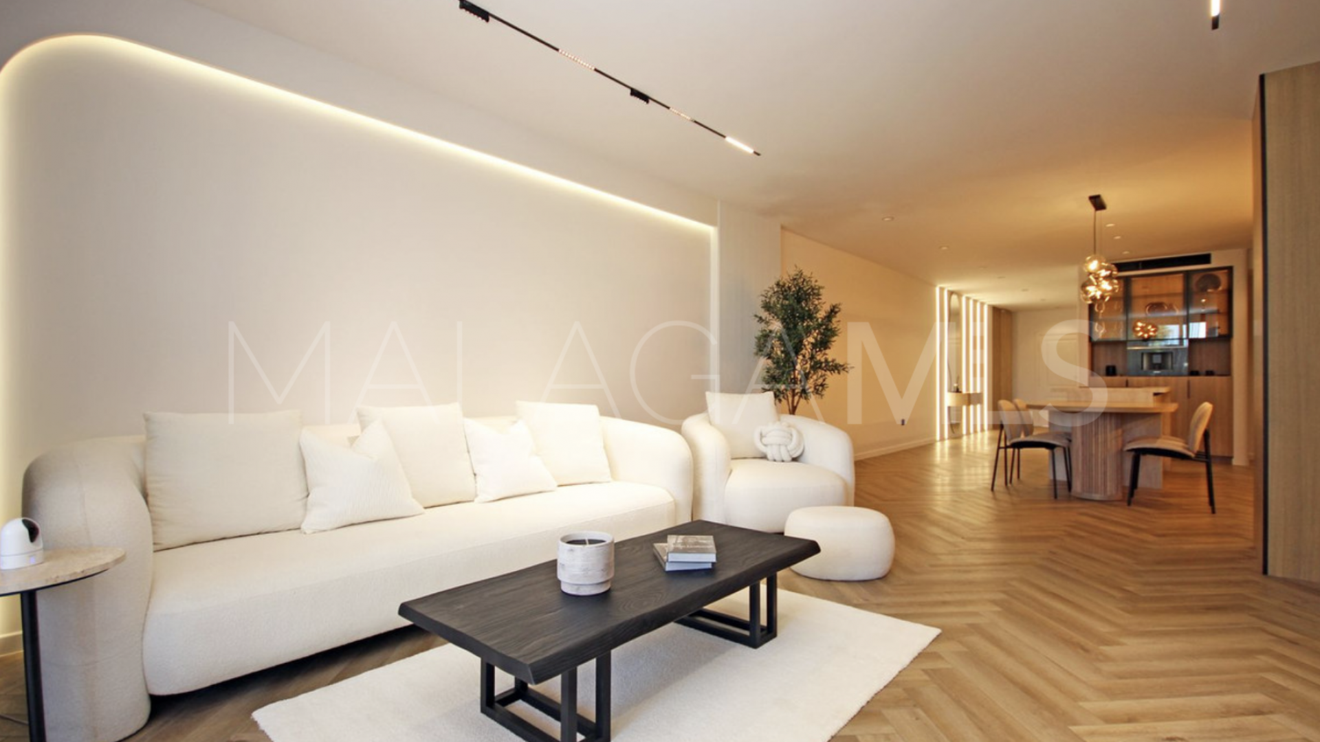 Buy Nueva Andalucia ground floor apartment