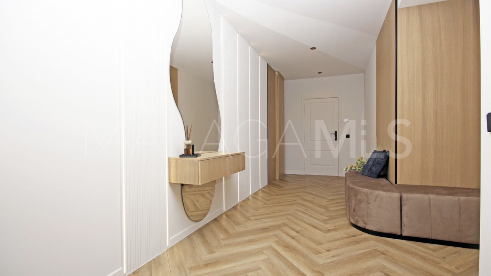 Buy Nueva Andalucia ground floor apartment
