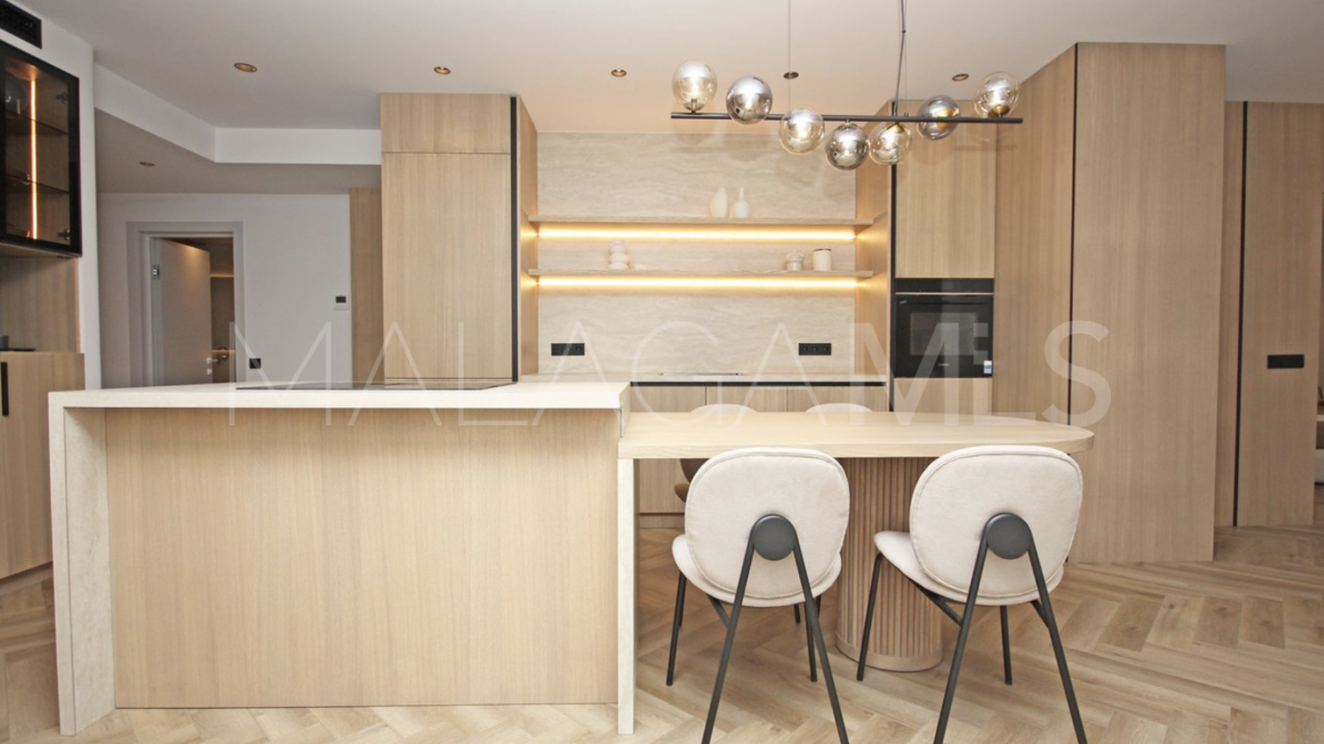 Buy Nueva Andalucia ground floor apartment