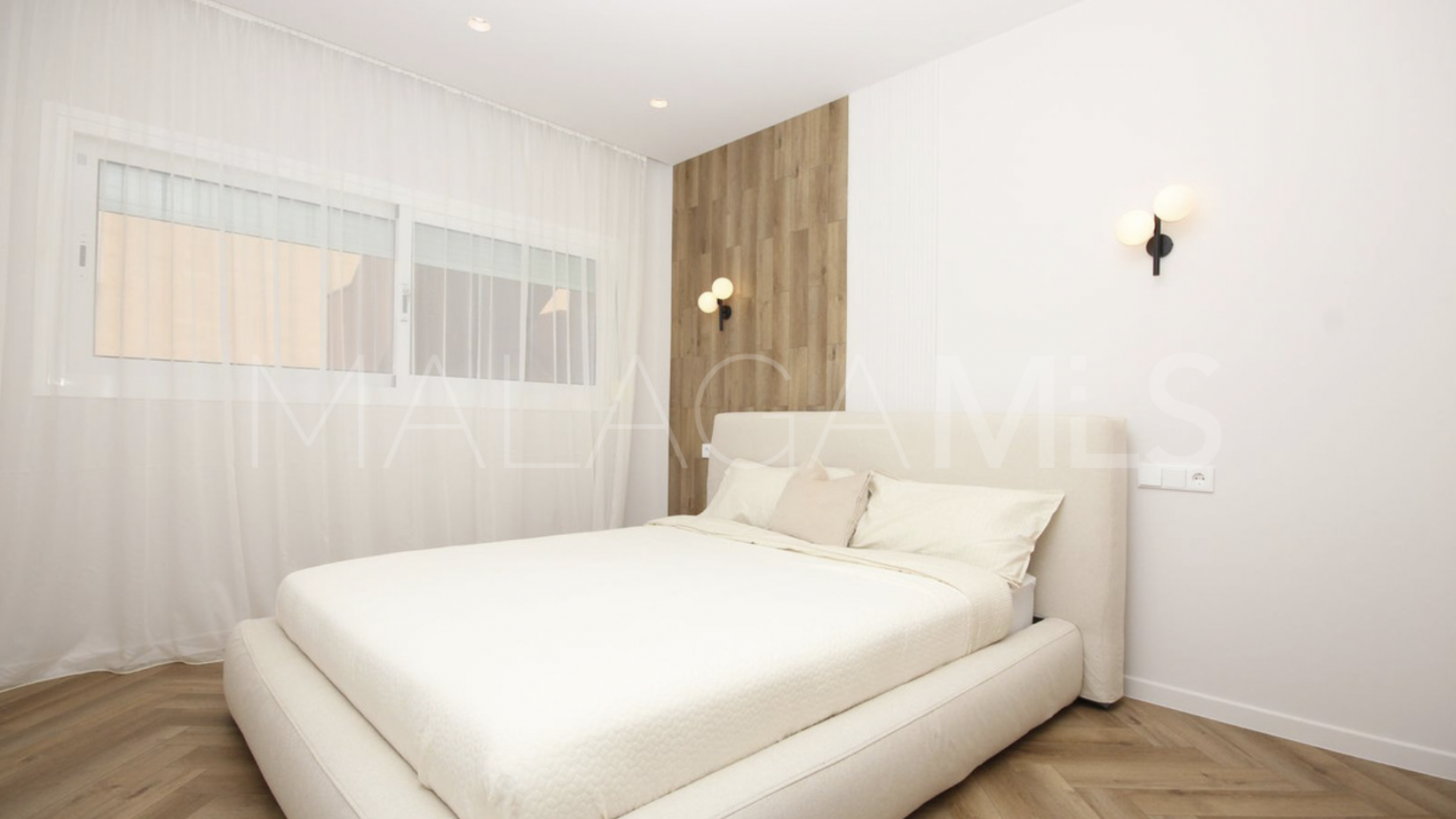 Buy Nueva Andalucia ground floor apartment