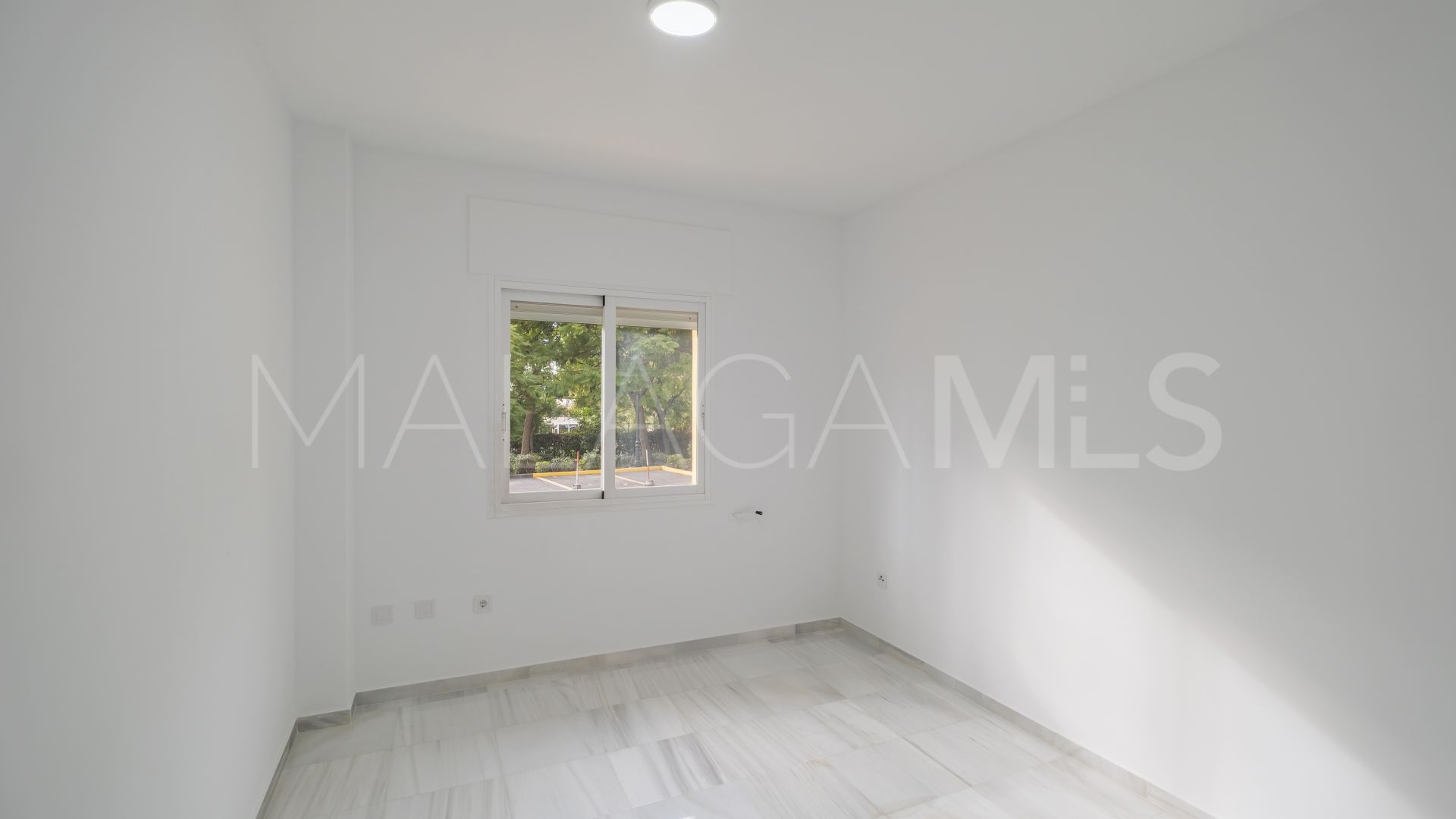 Buy Golden Mile ground floor apartment