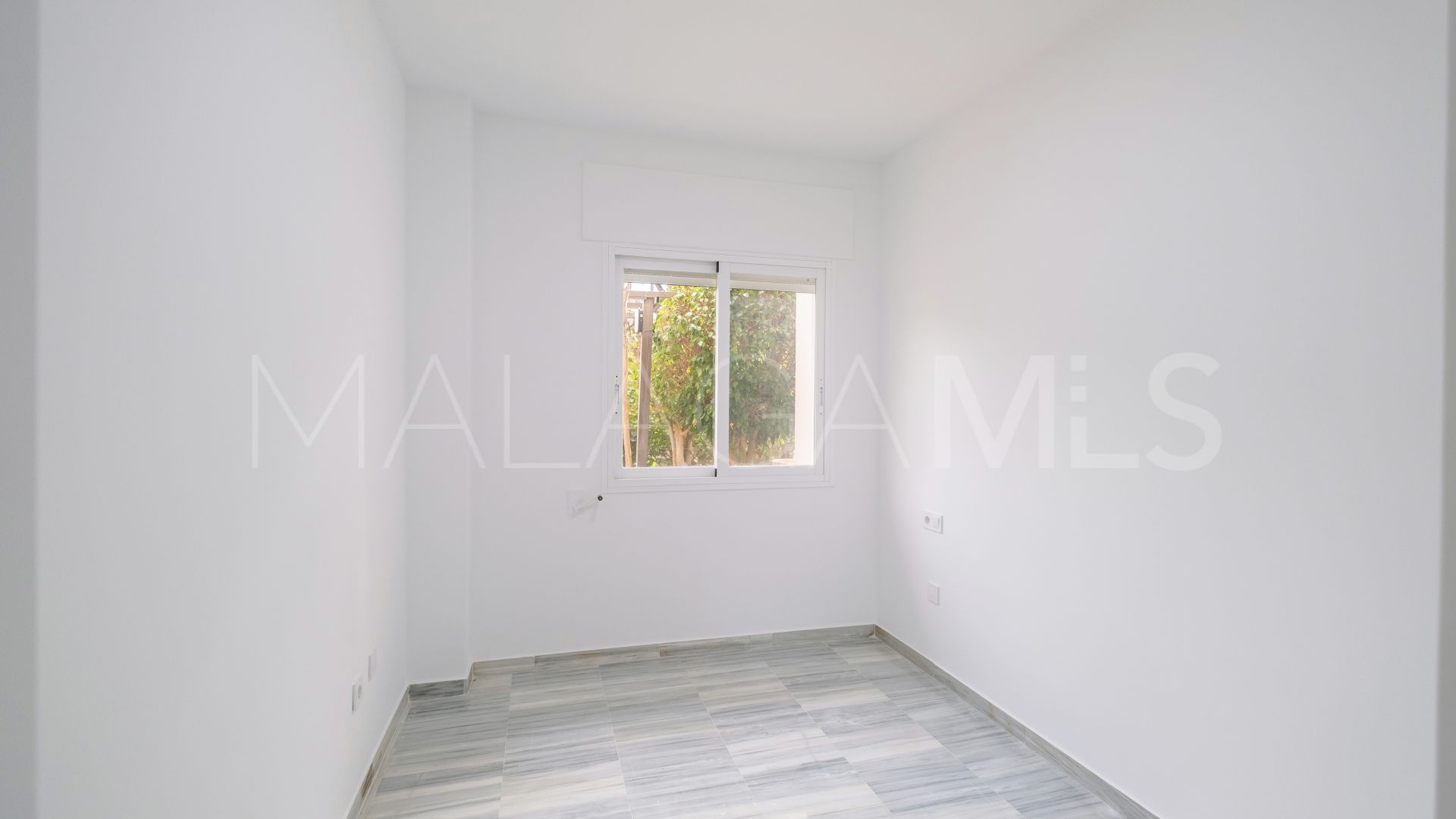 Buy Golden Mile ground floor apartment