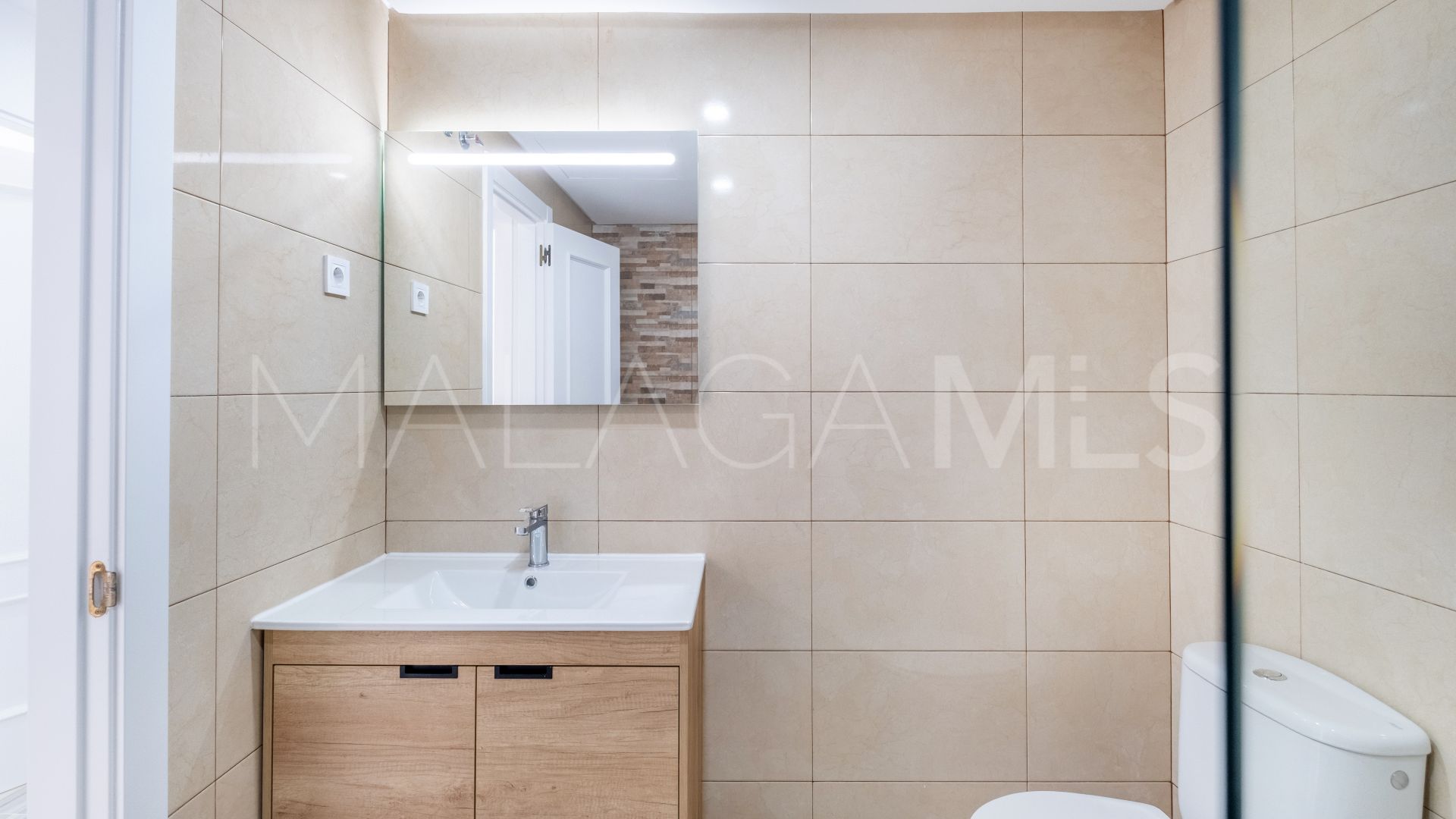 Buy Golden Mile ground floor apartment