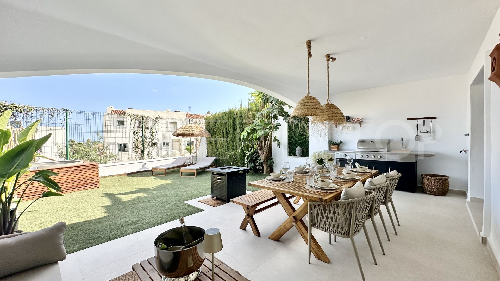 Buy Nueva Andalucia ground floor apartment