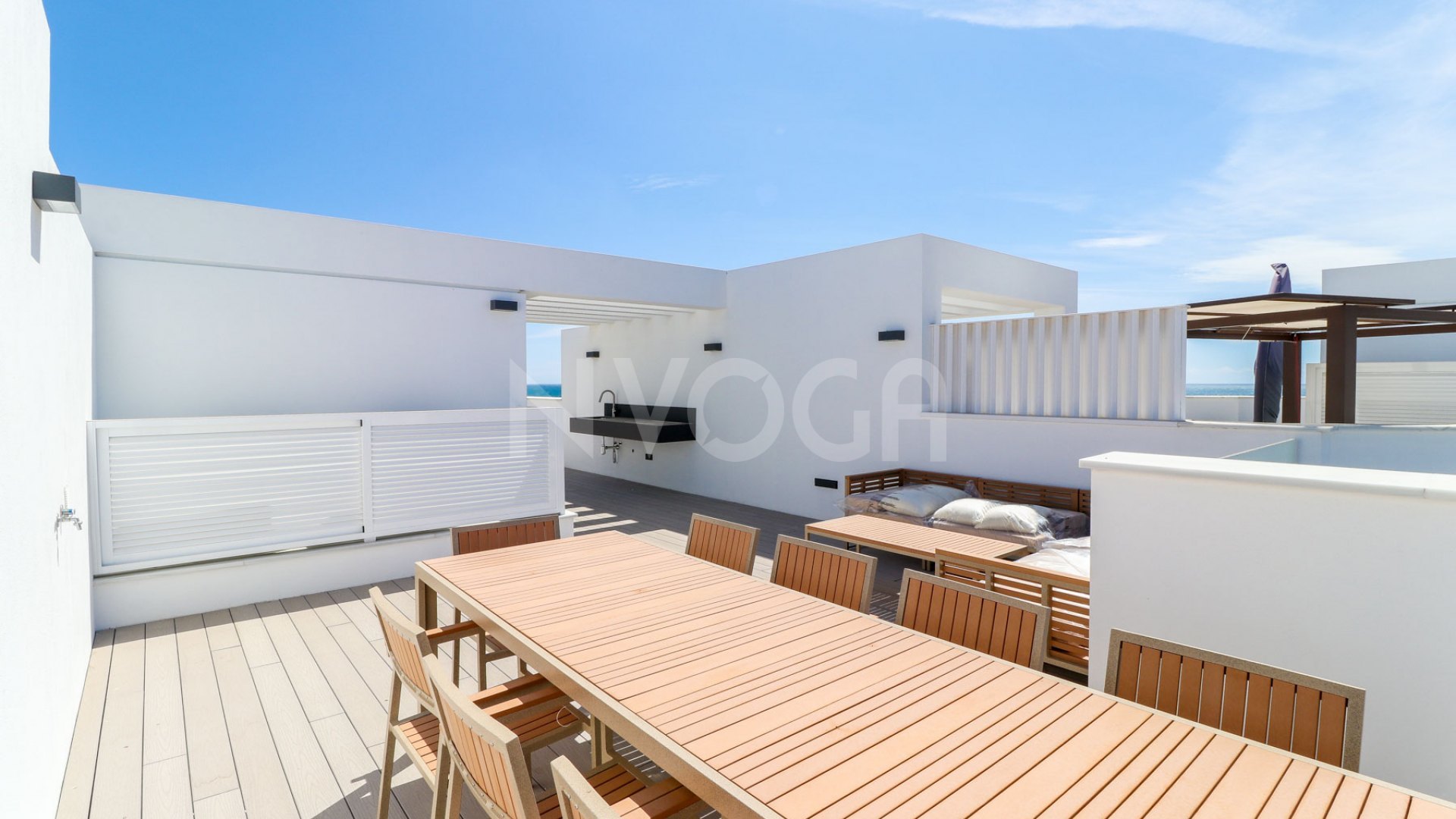 Gorgeous 3 bedroom beachfront townhouse in Estepona, with panoramic sea views.