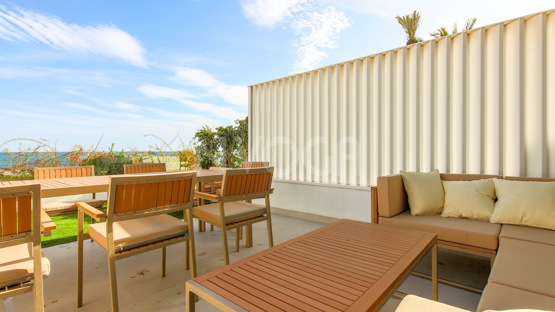 Gorgeous 3 bedroom beachfront townhouse in Estepona, with panoramic sea views.