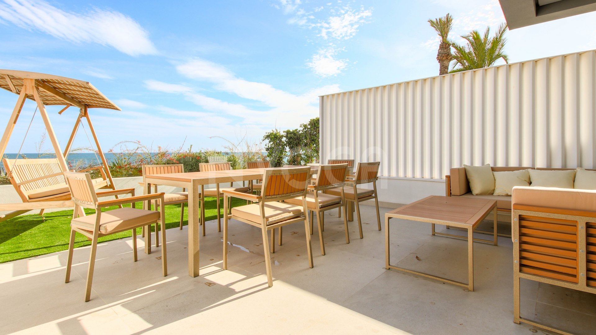 Gorgeous 3 bedroom beachfront townhouse in Estepona, with panoramic sea views.