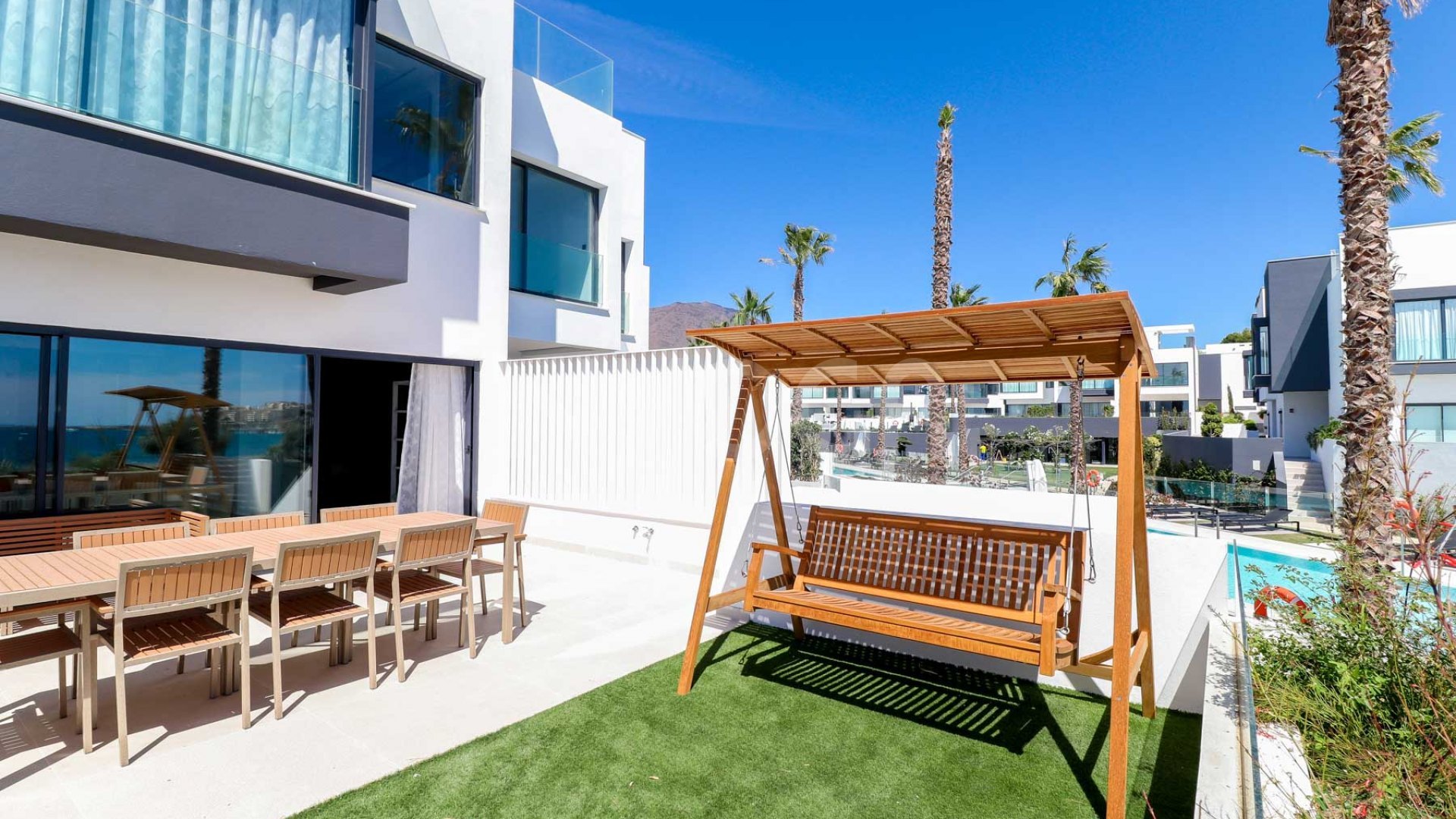 Gorgeous 3 bedroom beachfront townhouse in Estepona, with panoramic sea views.