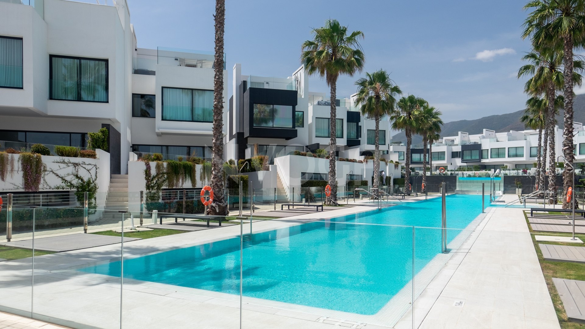 Gorgeous 3 bedroom beachfront townhouse in Estepona, with panoramic sea views.