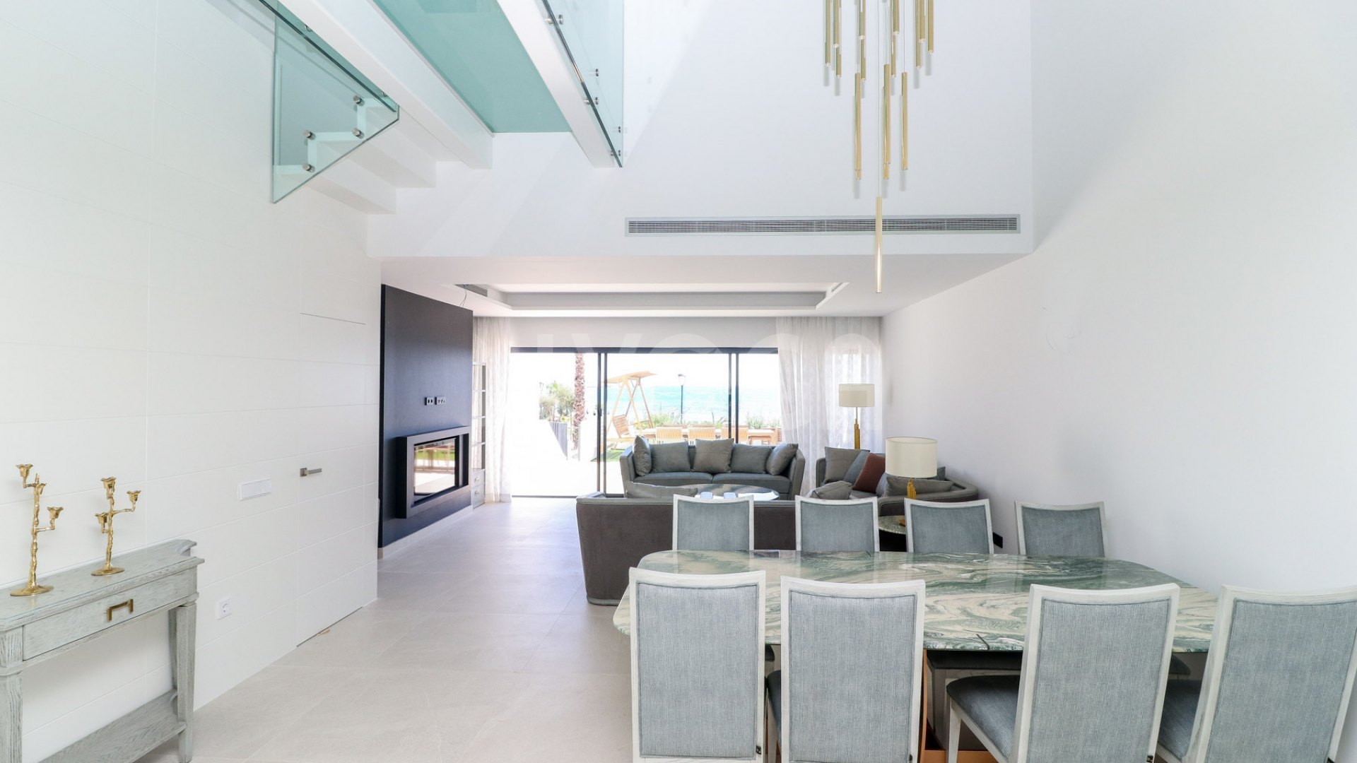Gorgeous 3 bedroom beachfront townhouse in Estepona, with panoramic sea views.