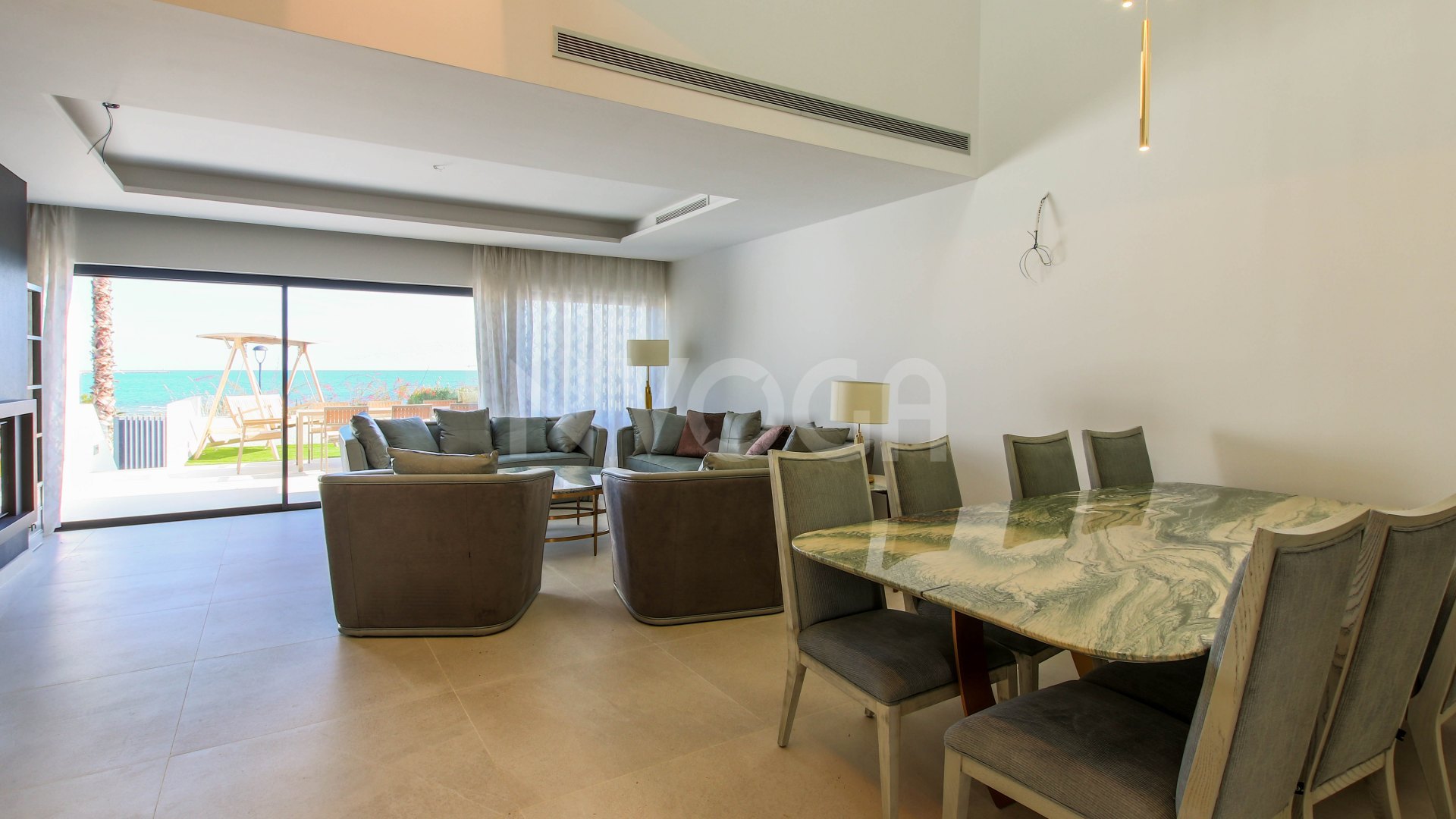 Gorgeous 3 bedroom beachfront townhouse in Estepona, with panoramic sea views.