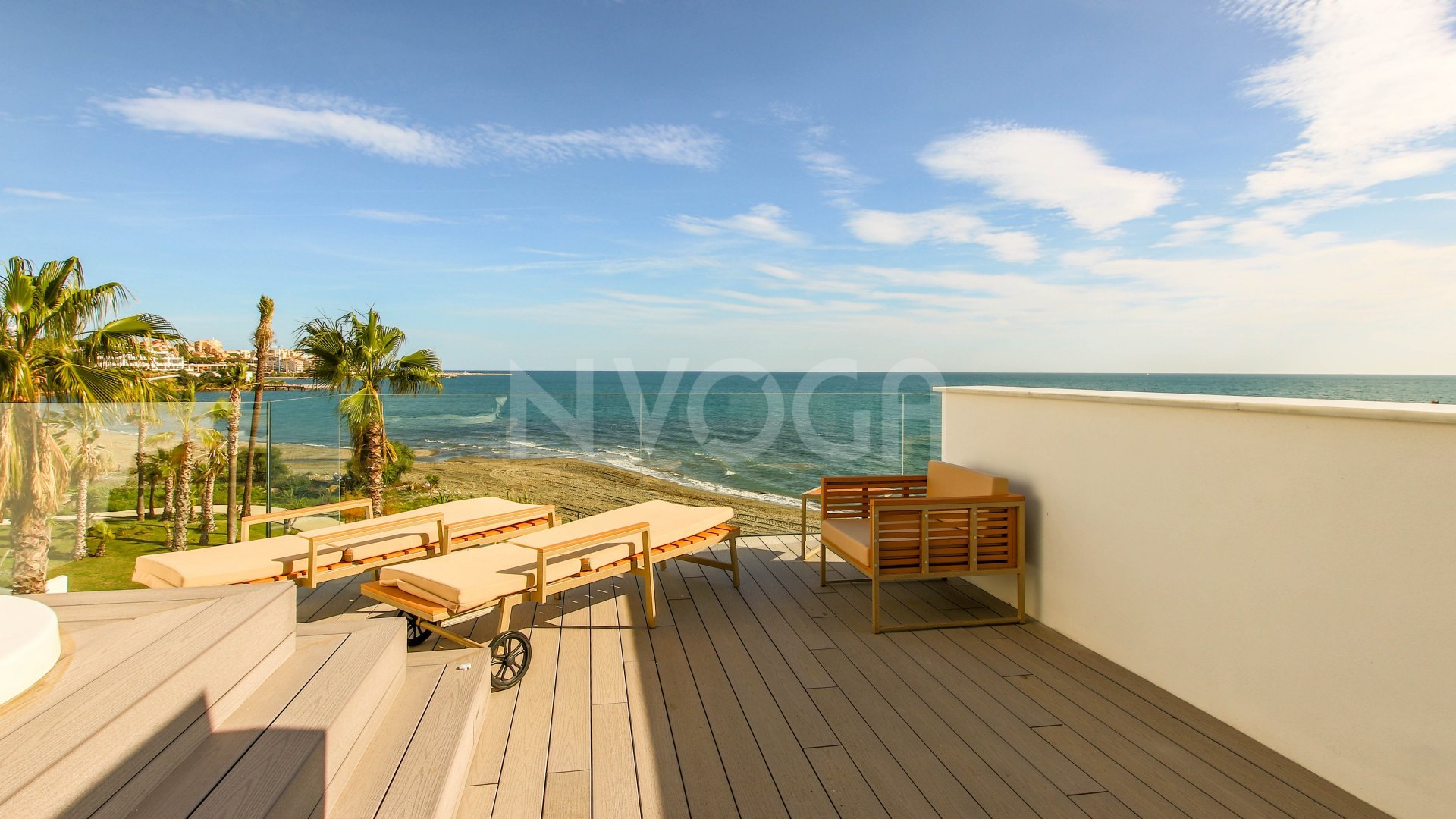 Gorgeous 3 bedroom beachfront townhouse in Estepona, with panoramic sea views.