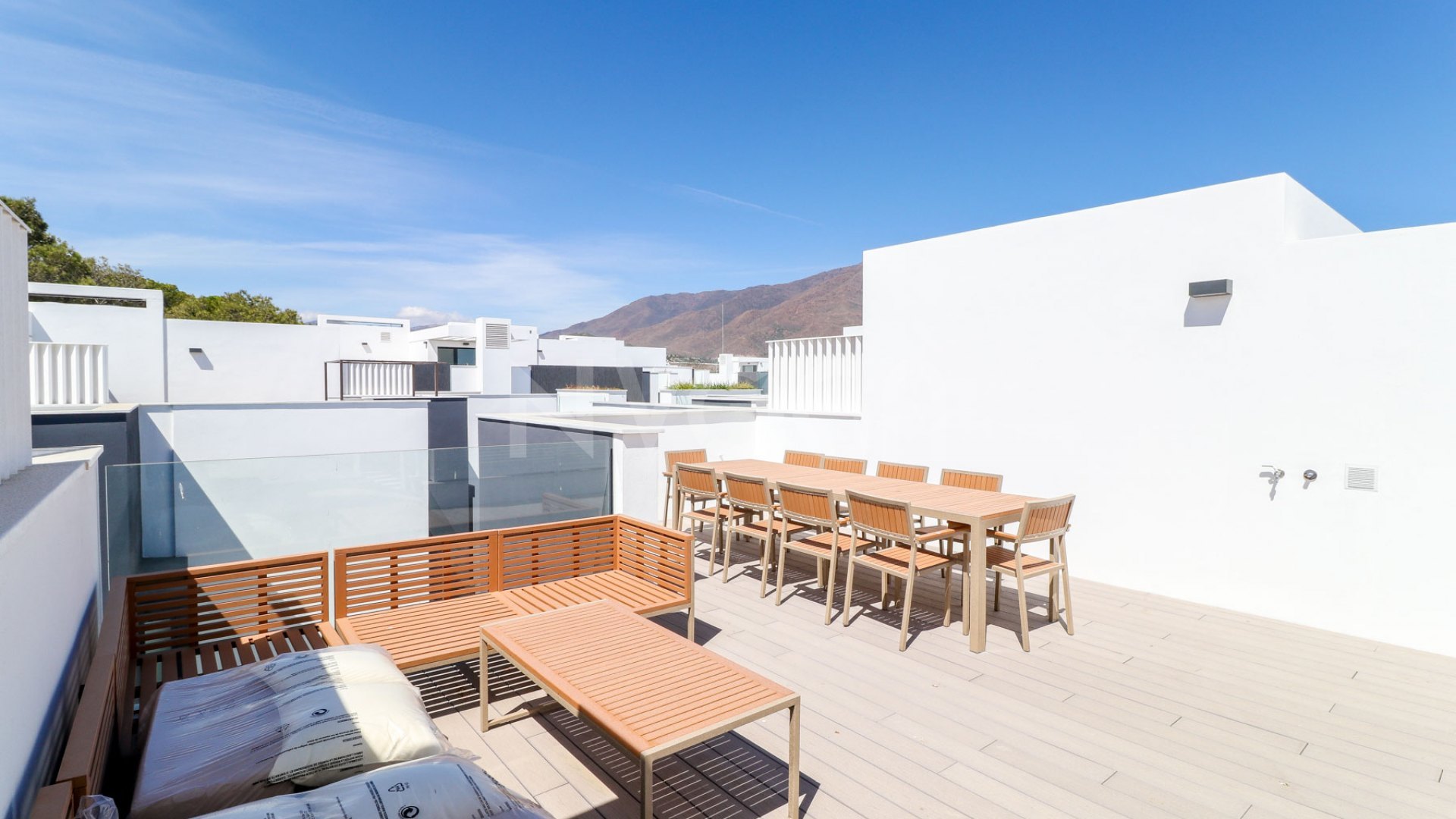 Gorgeous 3 bedroom beachfront townhouse in Estepona, with panoramic sea views.