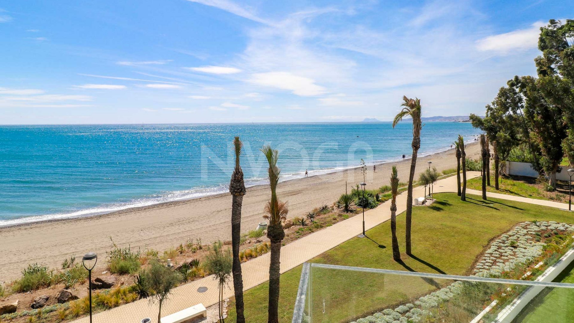 Gorgeous 3 bedroom beachfront townhouse in Estepona, with panoramic sea views.