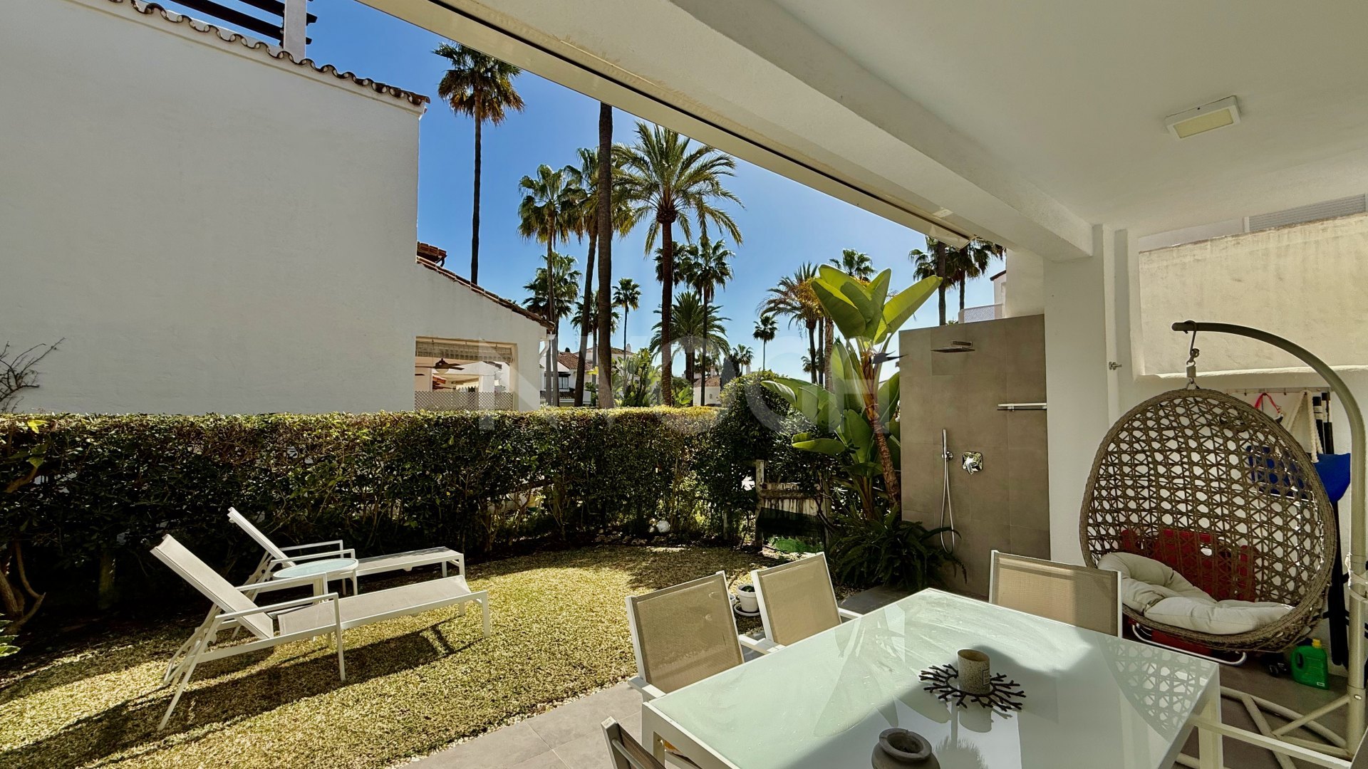 Magnificent front line beach townhouse, located in Bahia de Marbella, Marbella East.