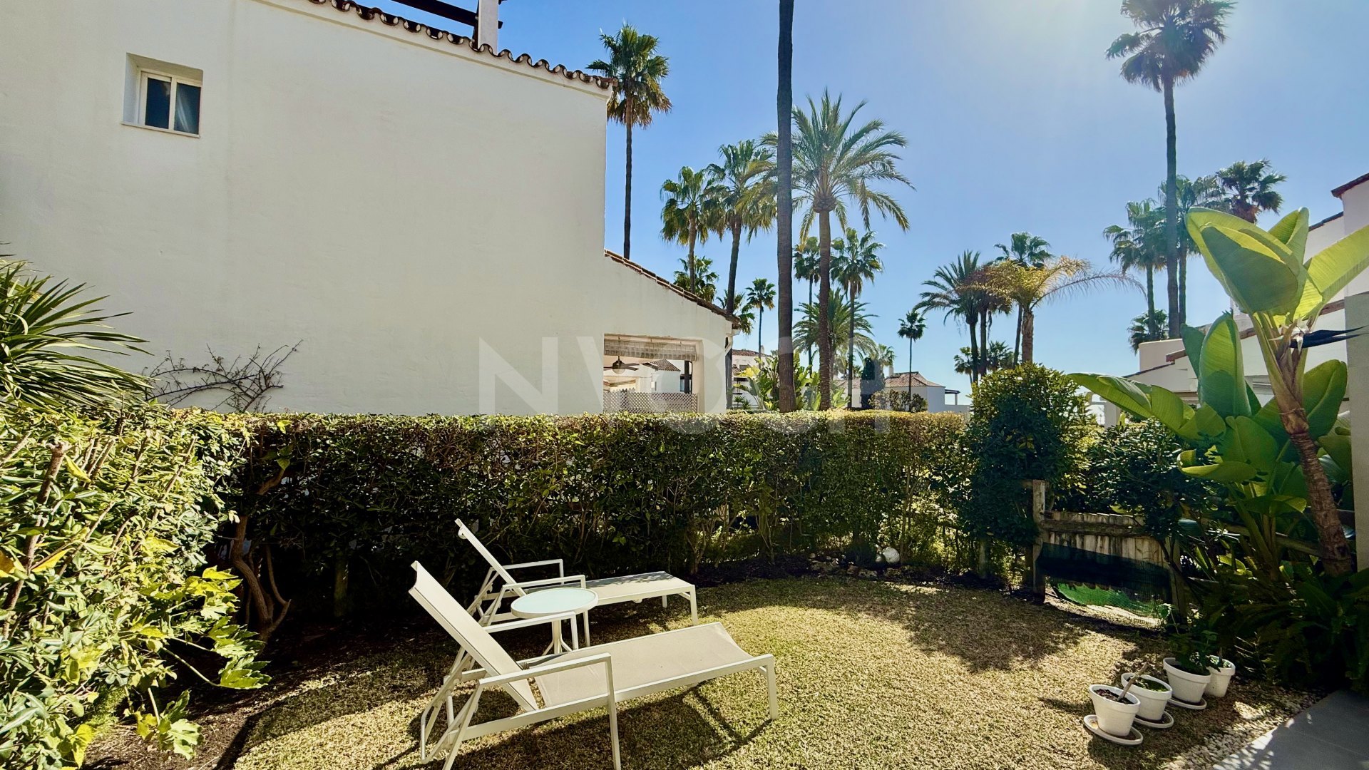Magnificent front line beach townhouse, located in Bahia de Marbella, Marbella East.