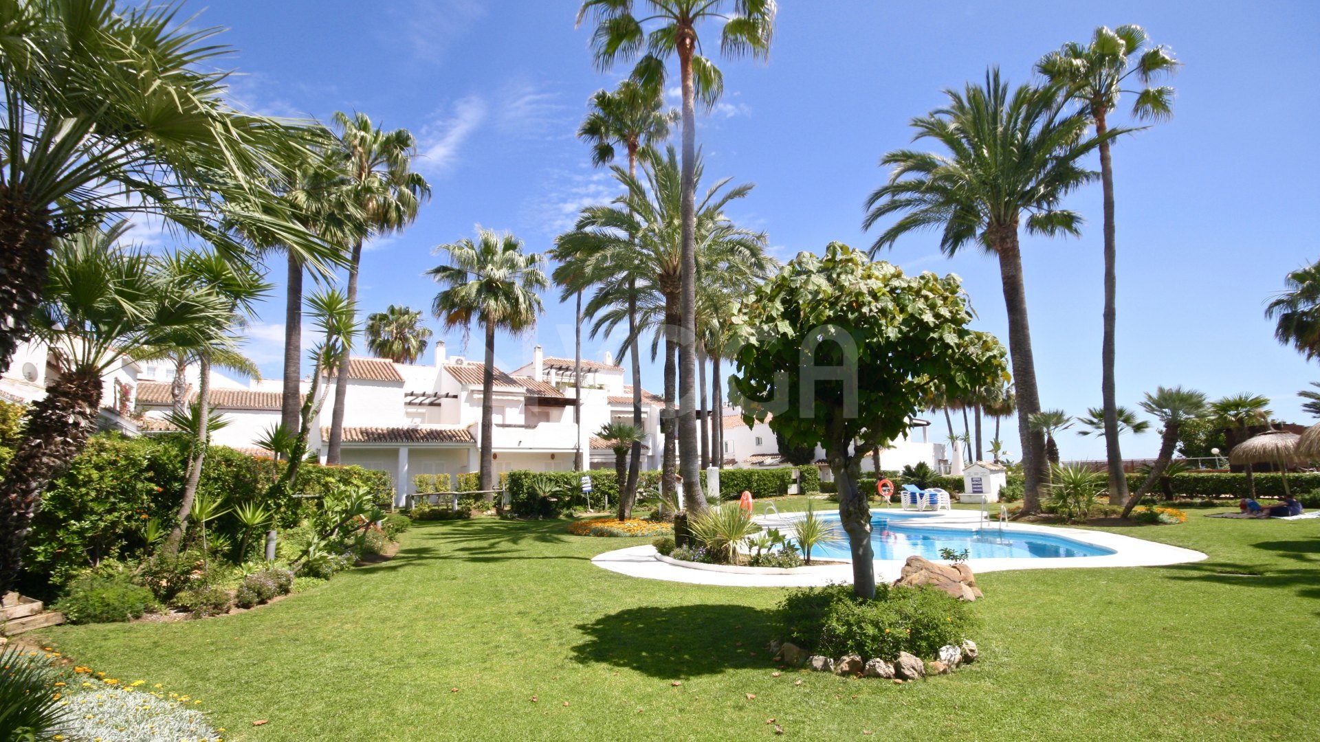 Magnificent front line beach townhouse, located in Bahia de Marbella, Marbella East.