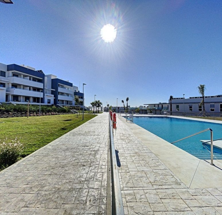 A gated residential complex of only 66 apartments of two or three bedrooms, less than 1 km away from the beach.