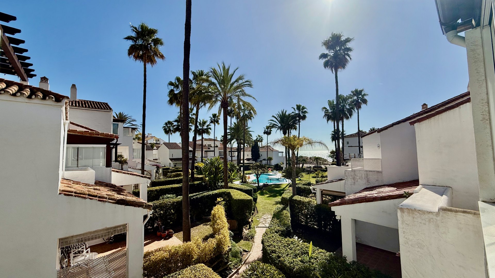 Magnificent front line beach townhouse, located in Bahia de Marbella, Marbella East.